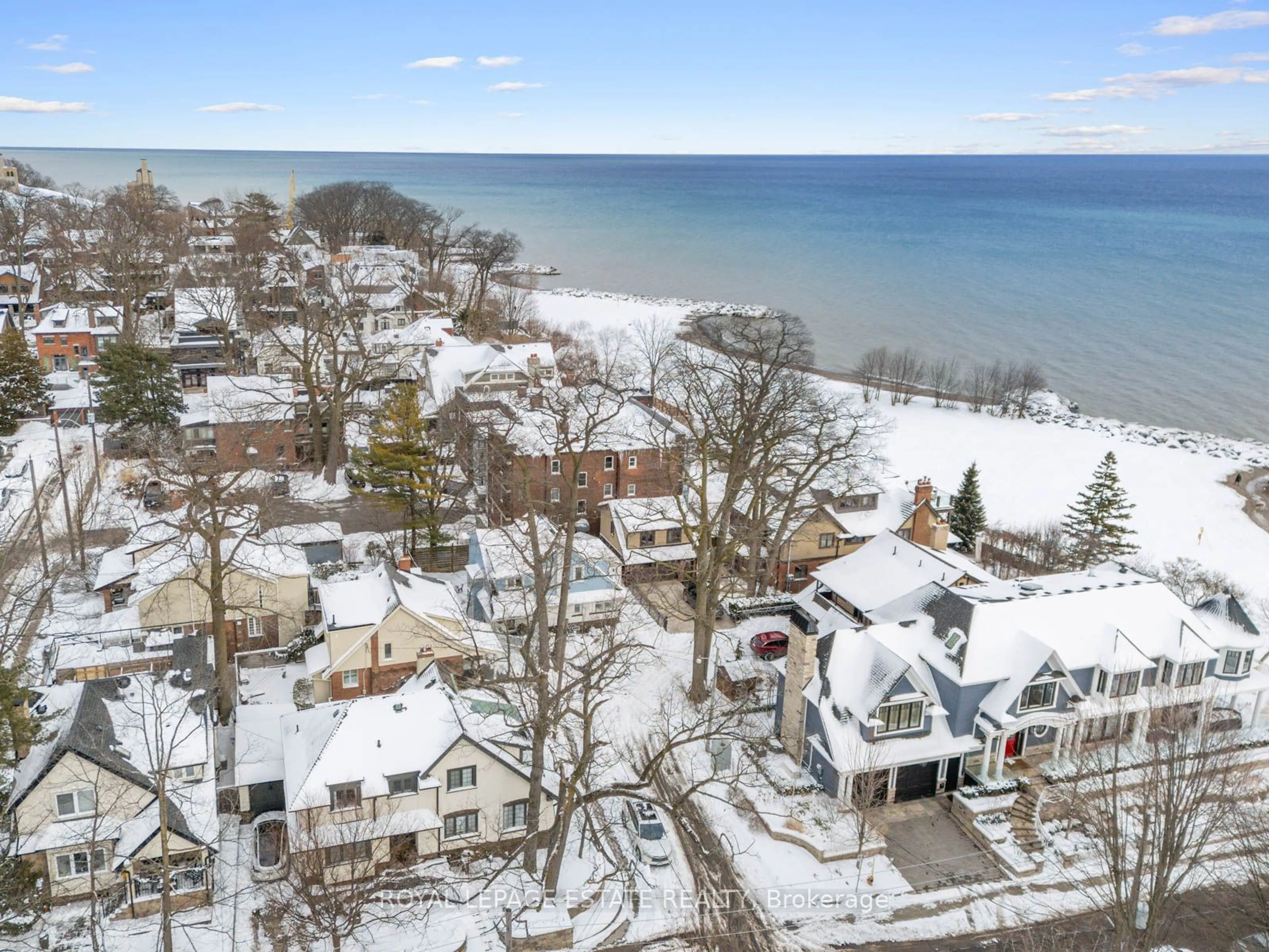 A pic from outside/outdoor area/front of a property/back of a property/a pic from drone, water/lake/river/ocean view for 15 Silver Birch Ave, Toronto Ontario M4E 3K8