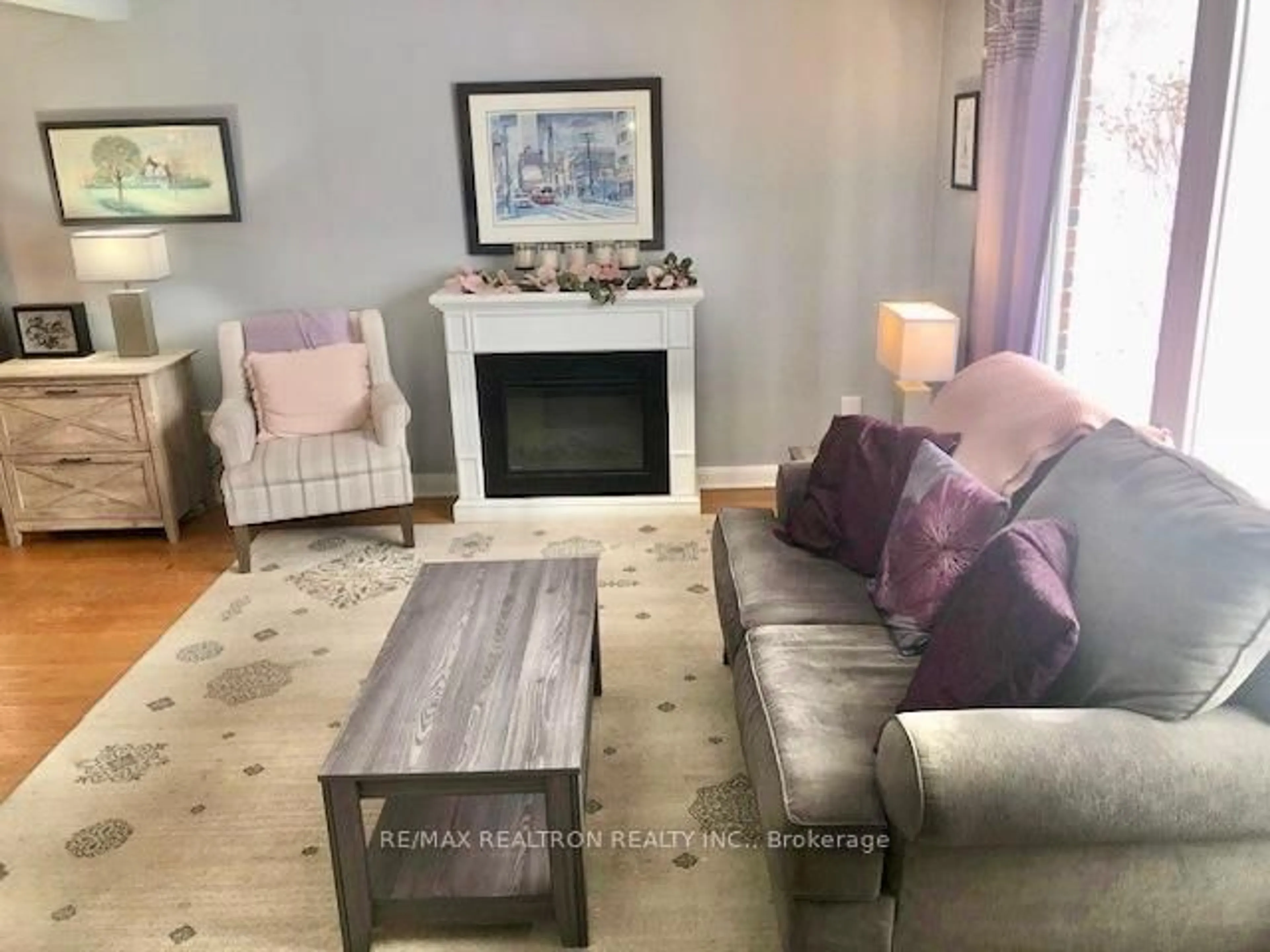 Living room with furniture, wood/laminate floor for 4 Elmdon Crt, Toronto Ontario M1J 1R1