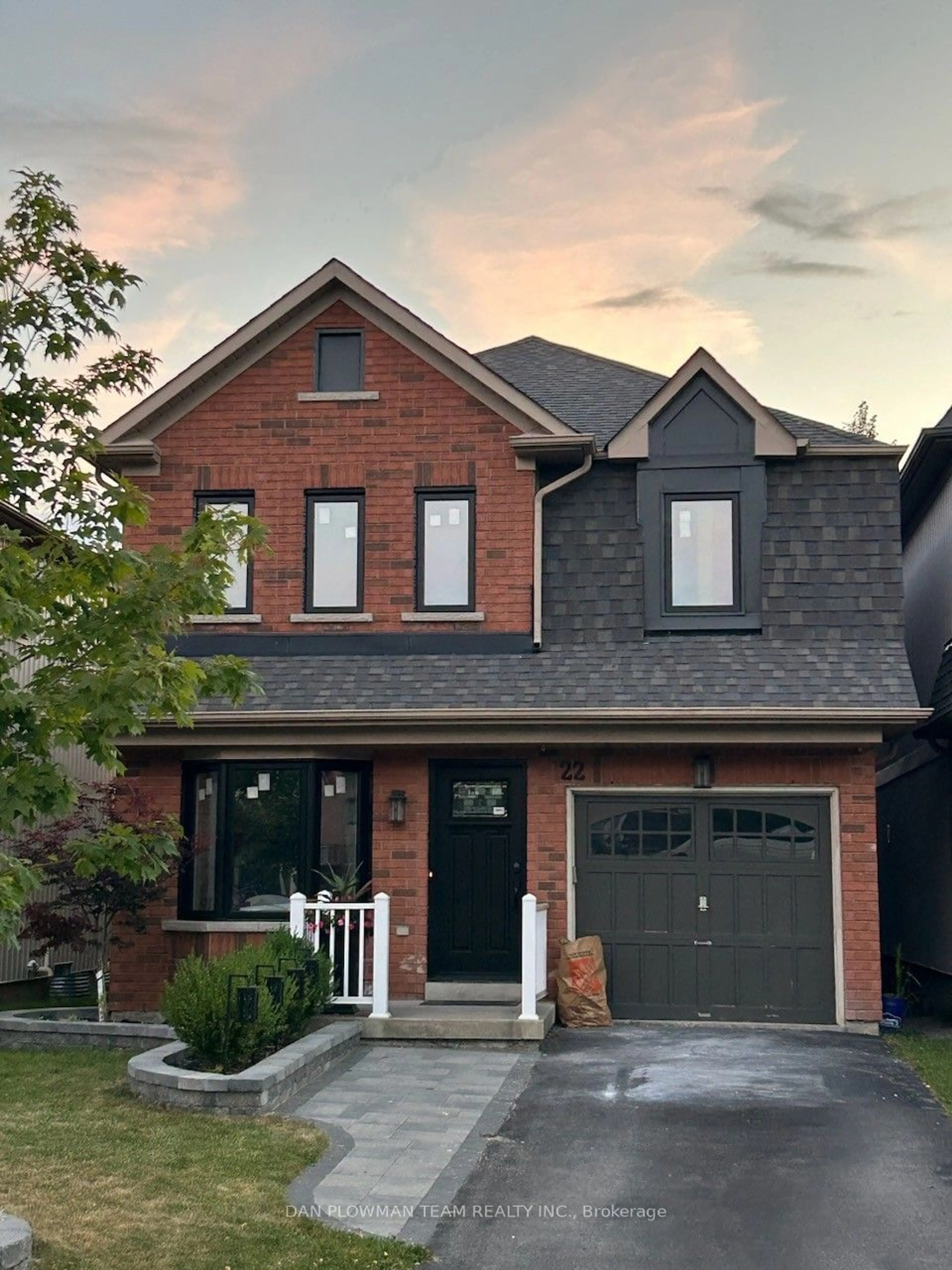 Home with brick exterior material, street for 22 Breezewood Crt, Whitby Ontario L1M 2L4