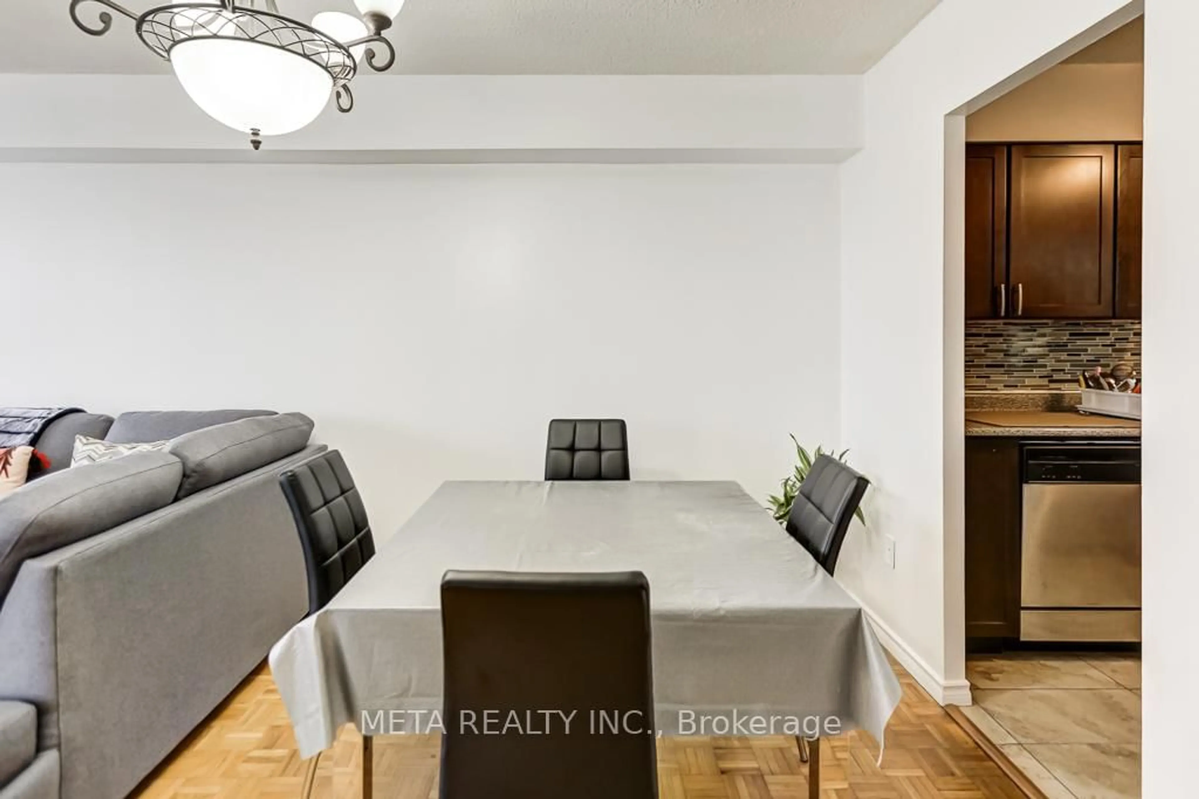 Dining room, wood/laminate floor for 3380 Eglinton Ave #1101, Toronto Ontario M1J 3L6