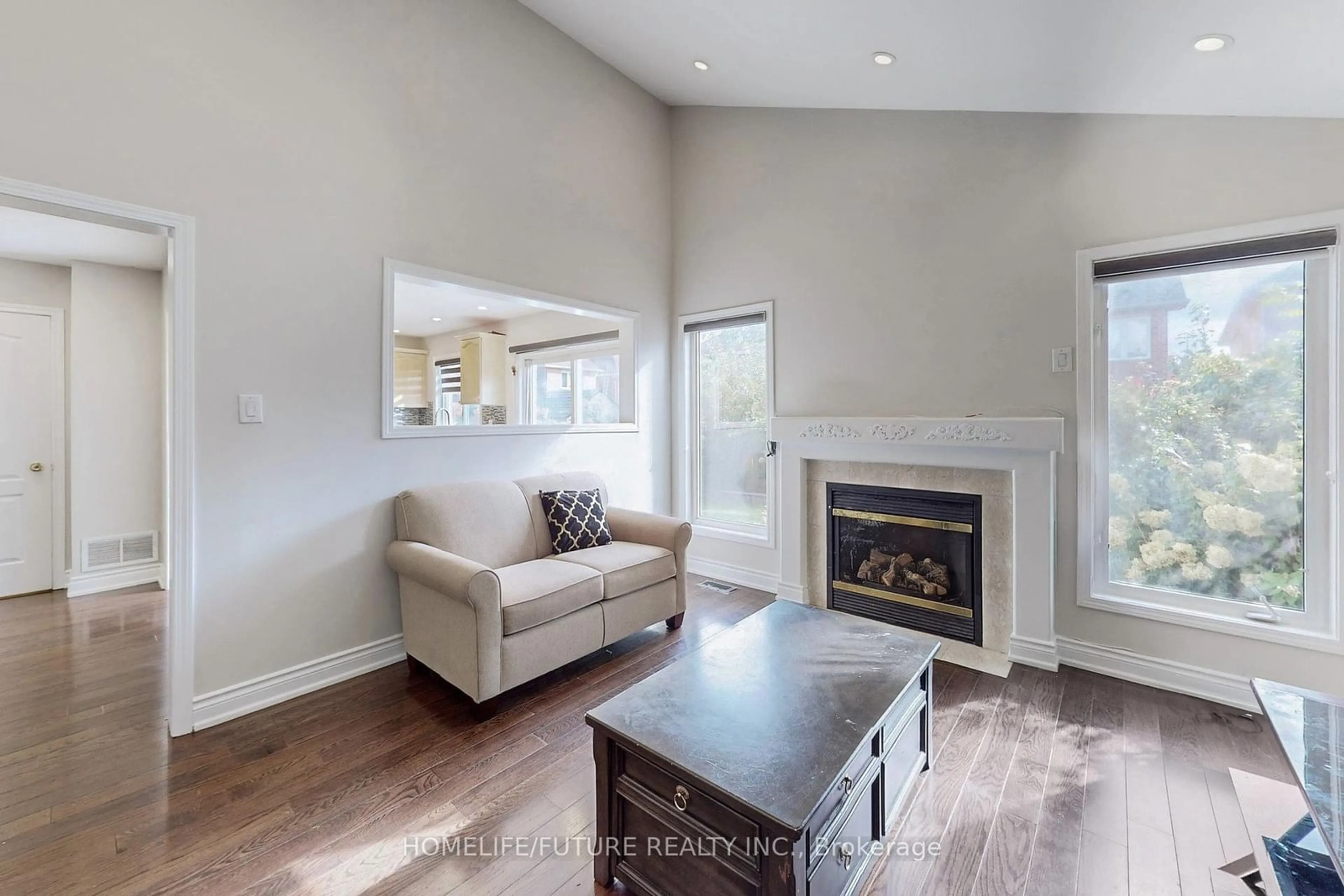 Living room with furniture, wood/laminate floor for 26 Salamander St, Toronto Ontario M1X 1Y9