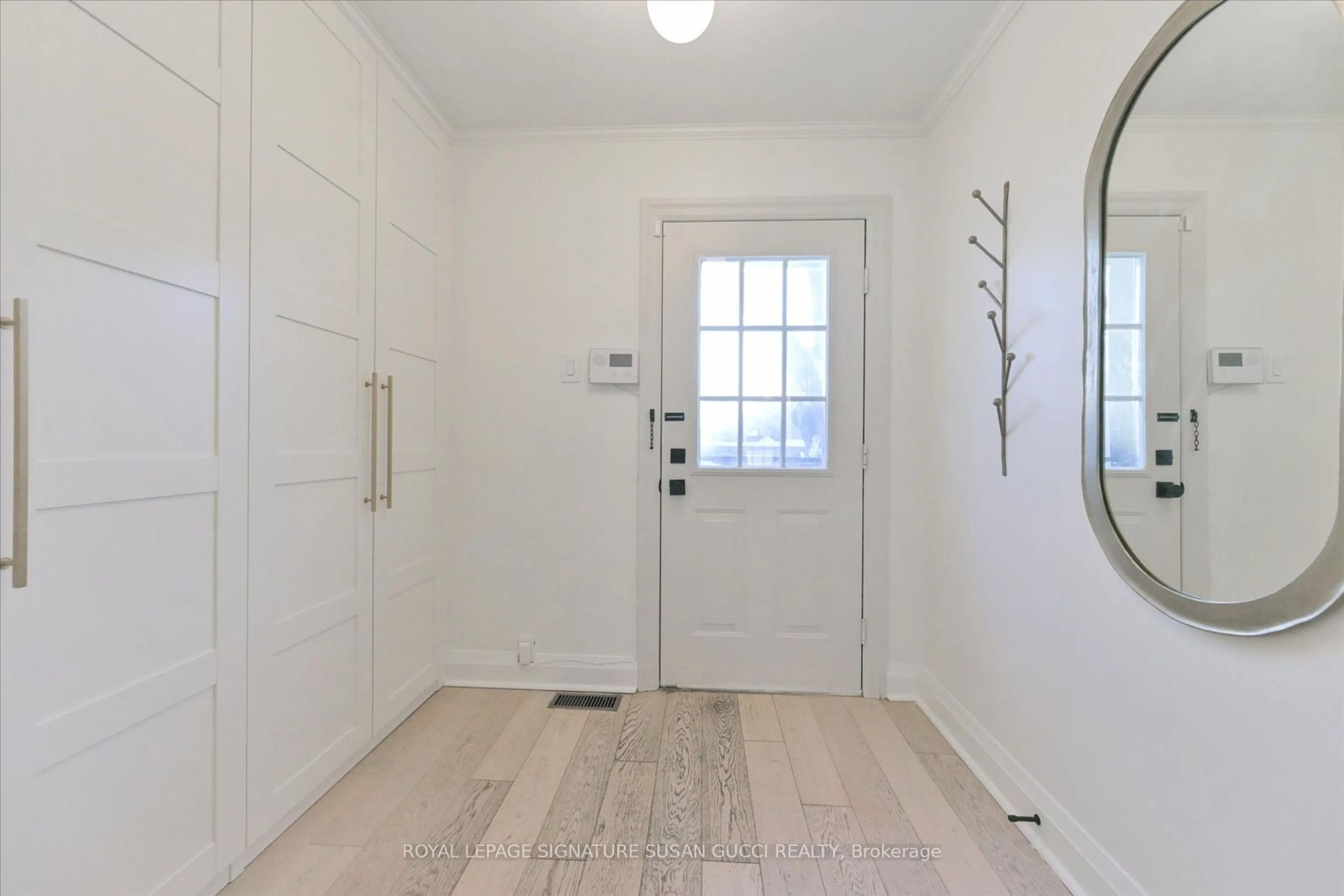 Indoor entryway for 98 Binswood Ave, Toronto Ontario M4C 3N9