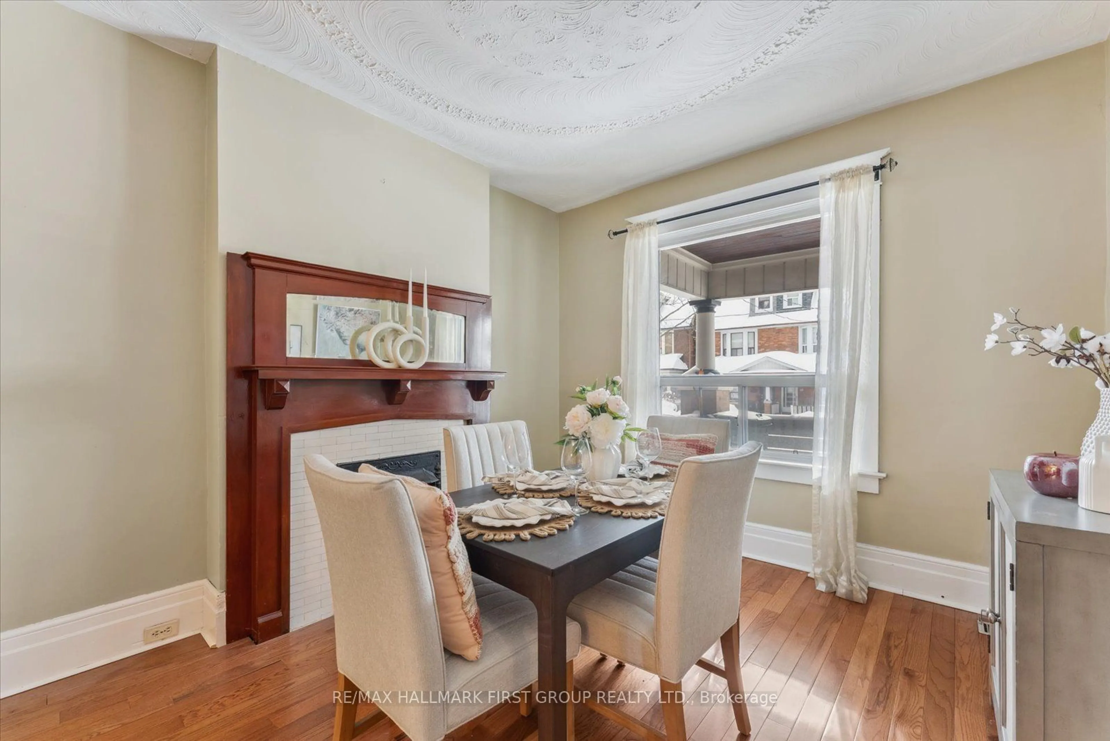 Dining room, wood/laminate floor for 176 Langley Ave, Toronto Ontario M4K 1B7