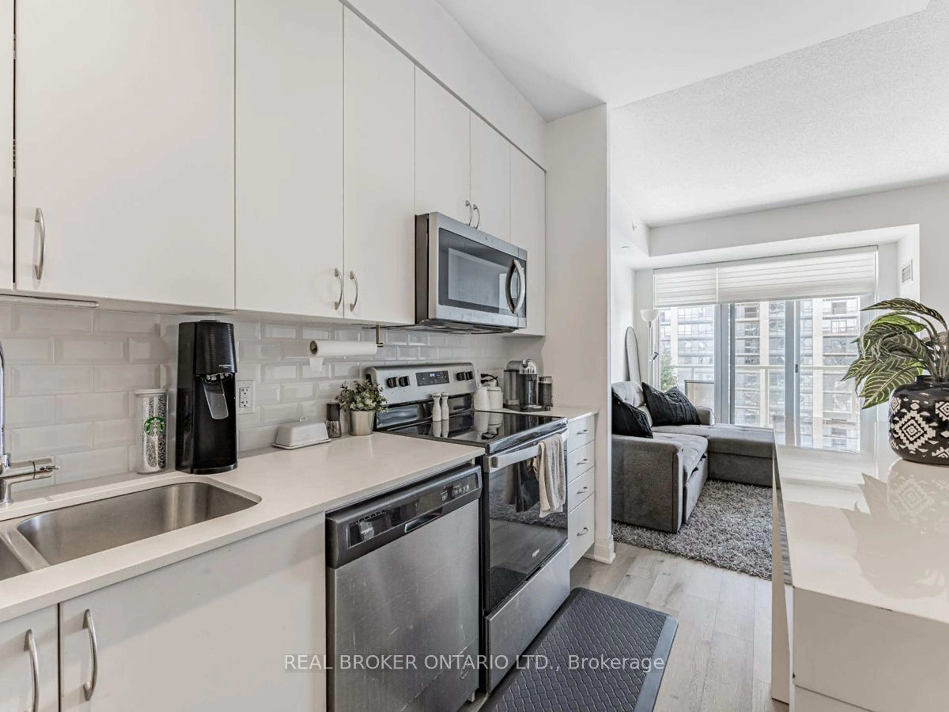 Open concept kitchen, ceramic/tile floor for 3220 Sheppard Ave #1206, Toronto Ontario M1T 3K3