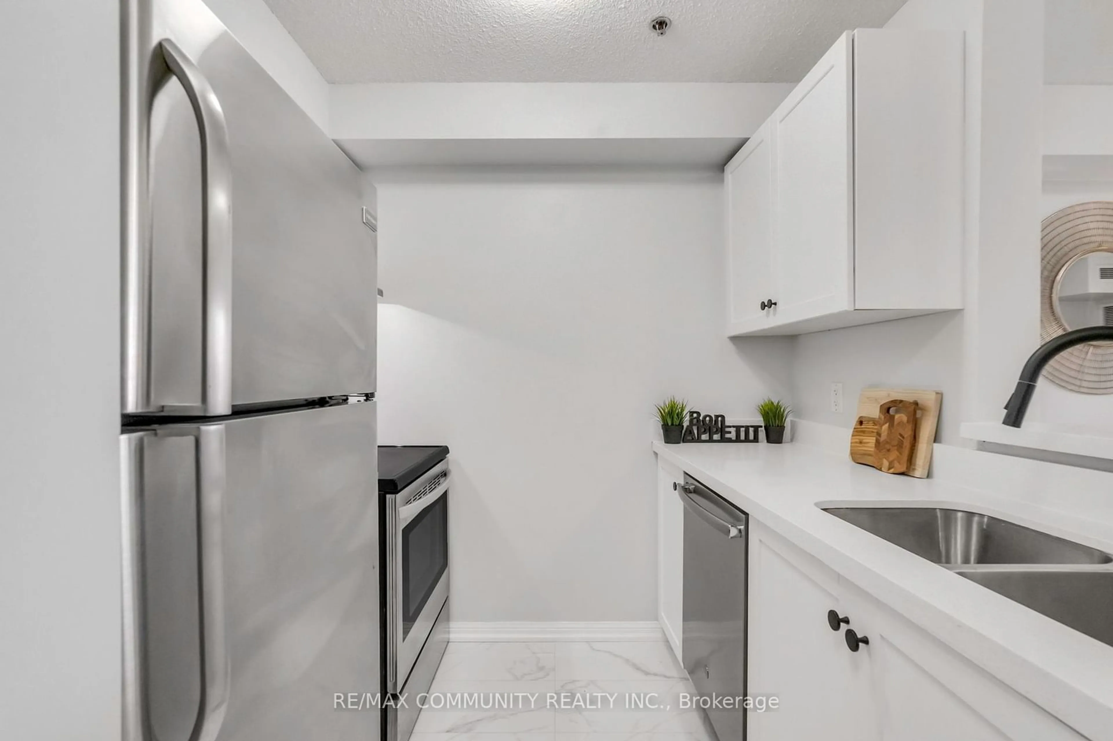 Standard kitchen, ceramic/tile floor for 5225 Finch Ave #310, Toronto Ontario M1S 5W8