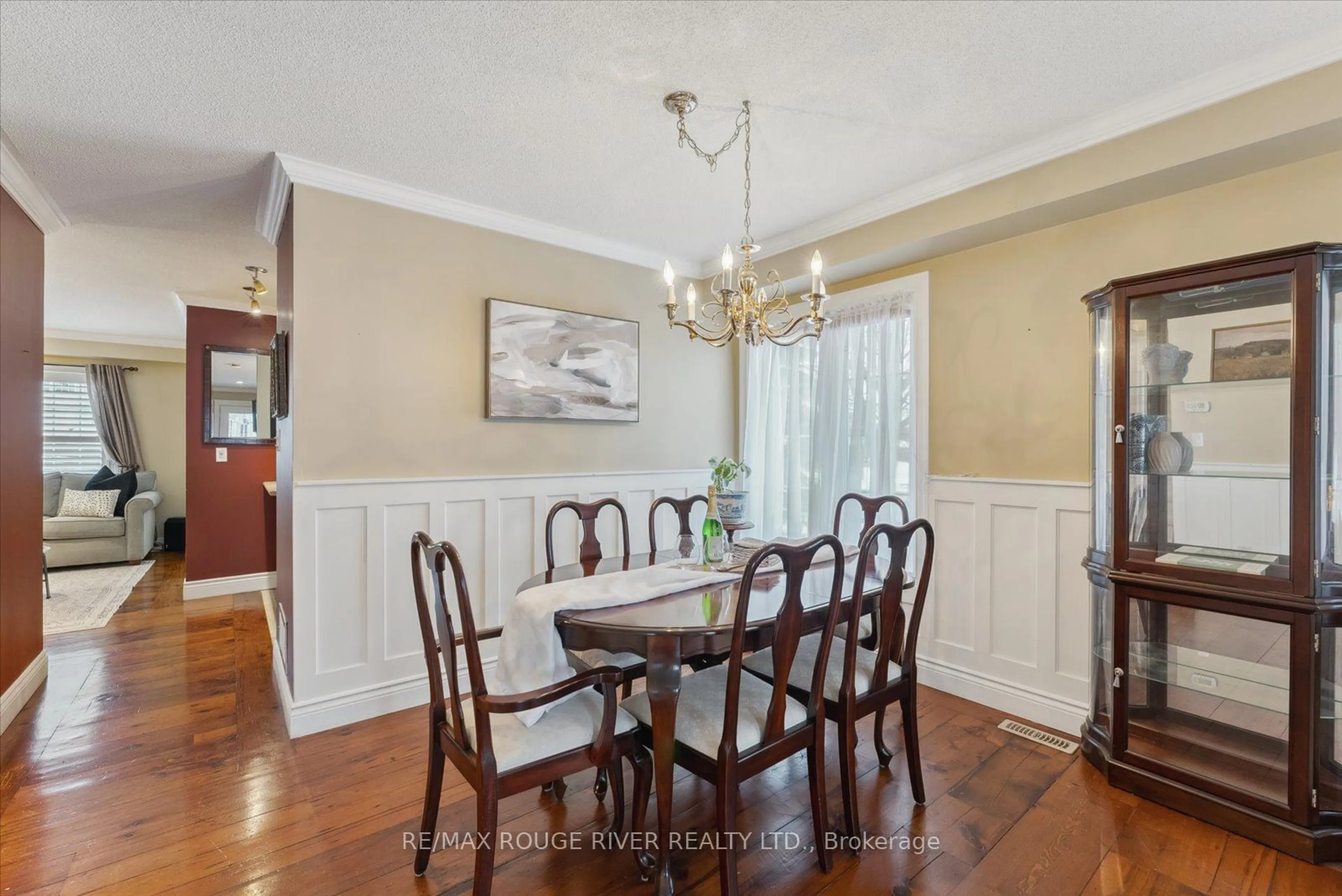 Dining room, wood/laminate floor for 31 Barchester Cres, Whitby Ontario L1M 2L7