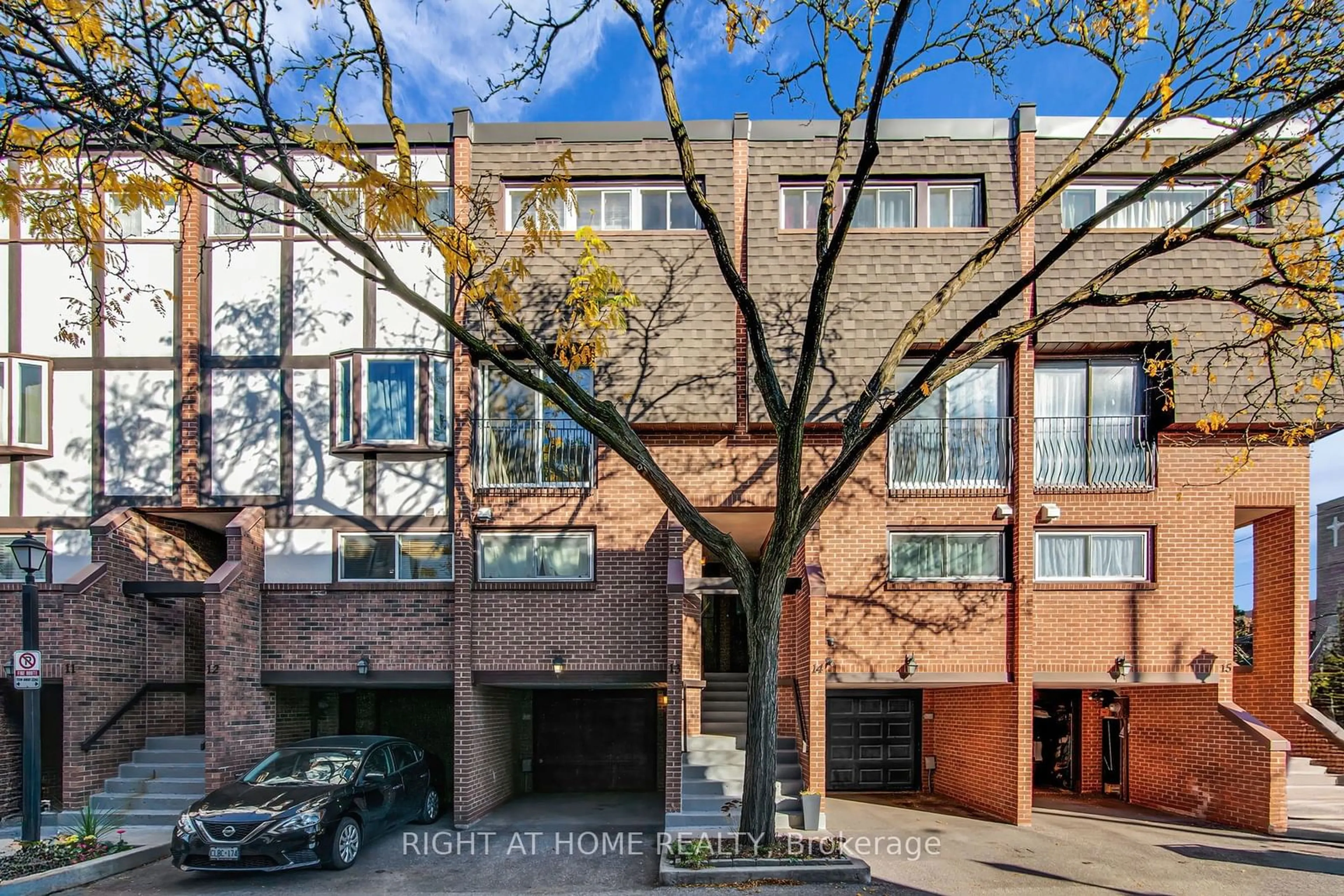 Home with brick exterior material, street for 2716 St Clair Ave #13, Toronto Ontario M4B 1M6