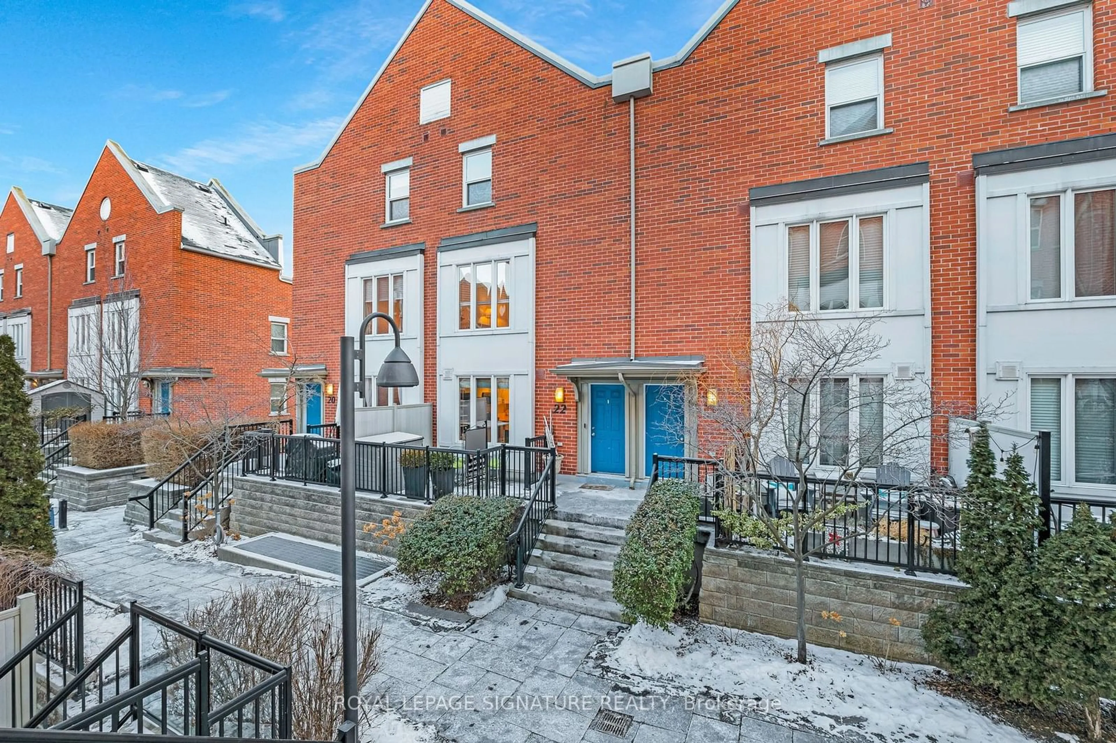 Home with brick exterior material, street for 22 Frances Loring Lane #1, Toronto Ontario M4M 3E8