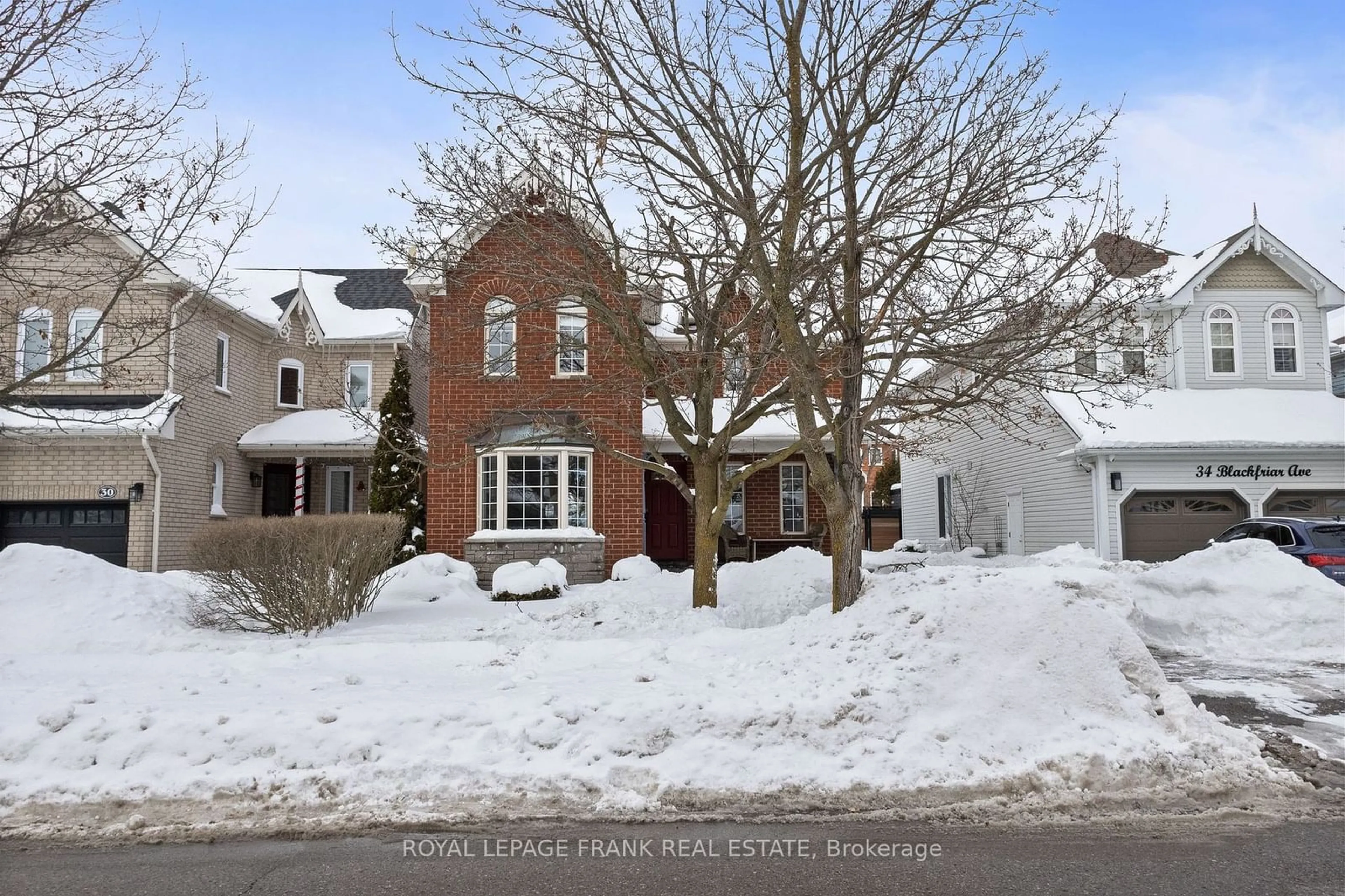 Home with brick exterior material, street for 32 Blackfriar Ave, Whitby Ontario L1M 1E4