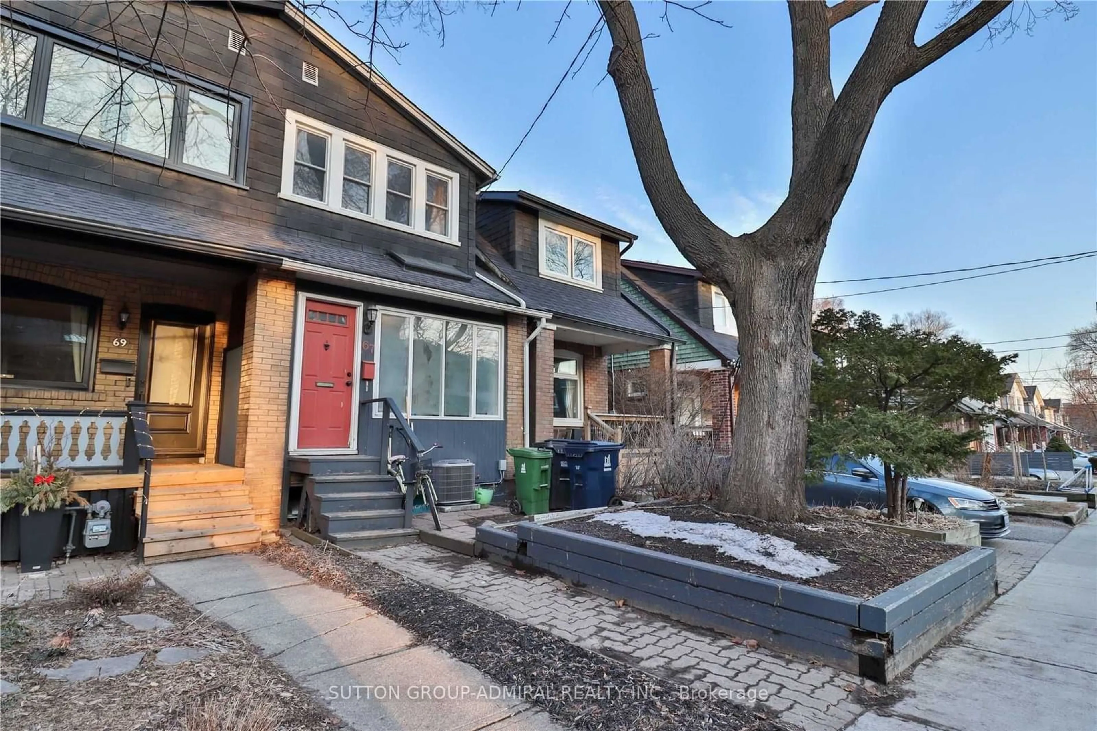 Home with brick exterior material, street for 67 Gainsborough Rd, Toronto Ontario M4L 3C1