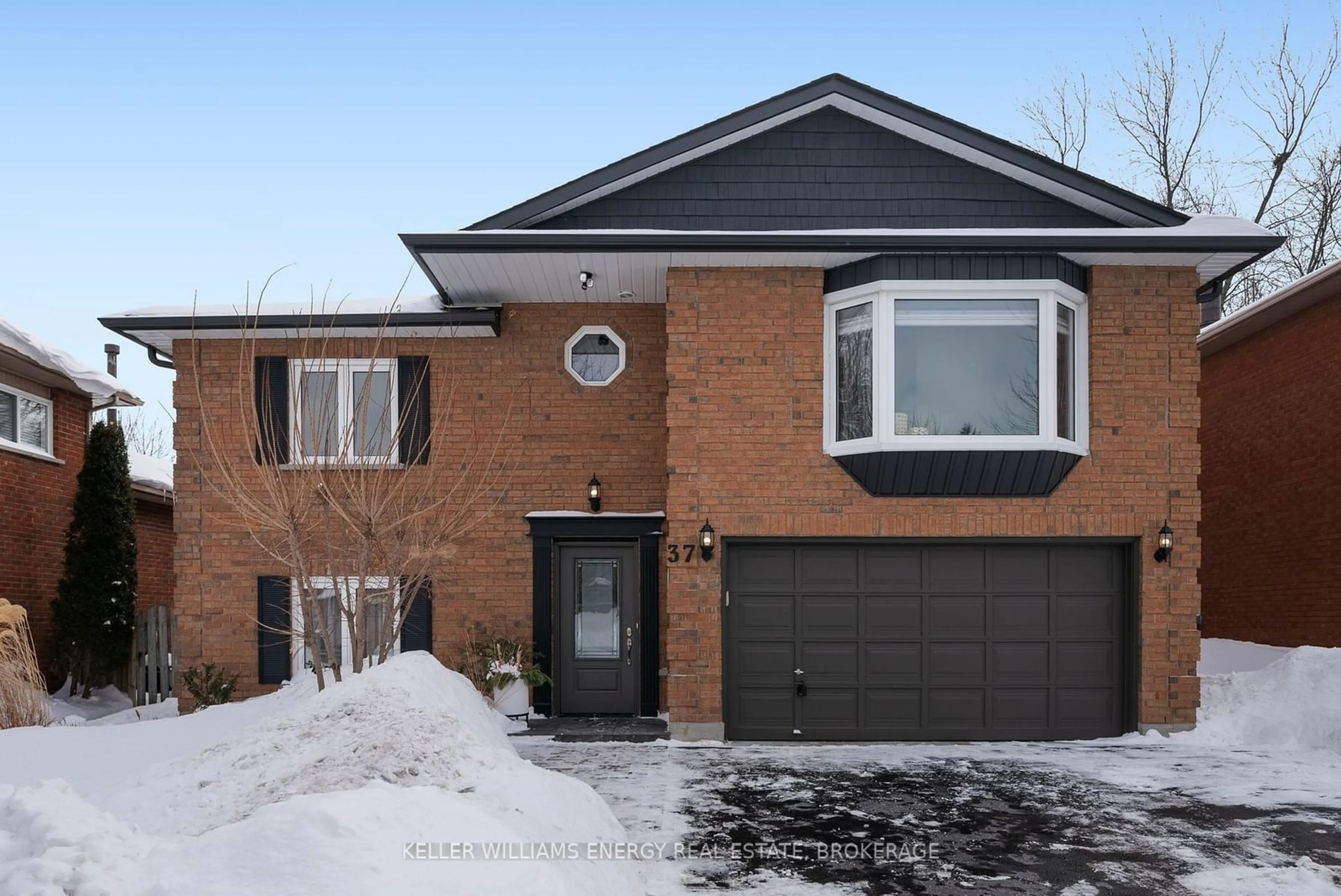 Home with brick exterior material, street for 37 Limestone Cres, Whitby Ontario L1N 8P1