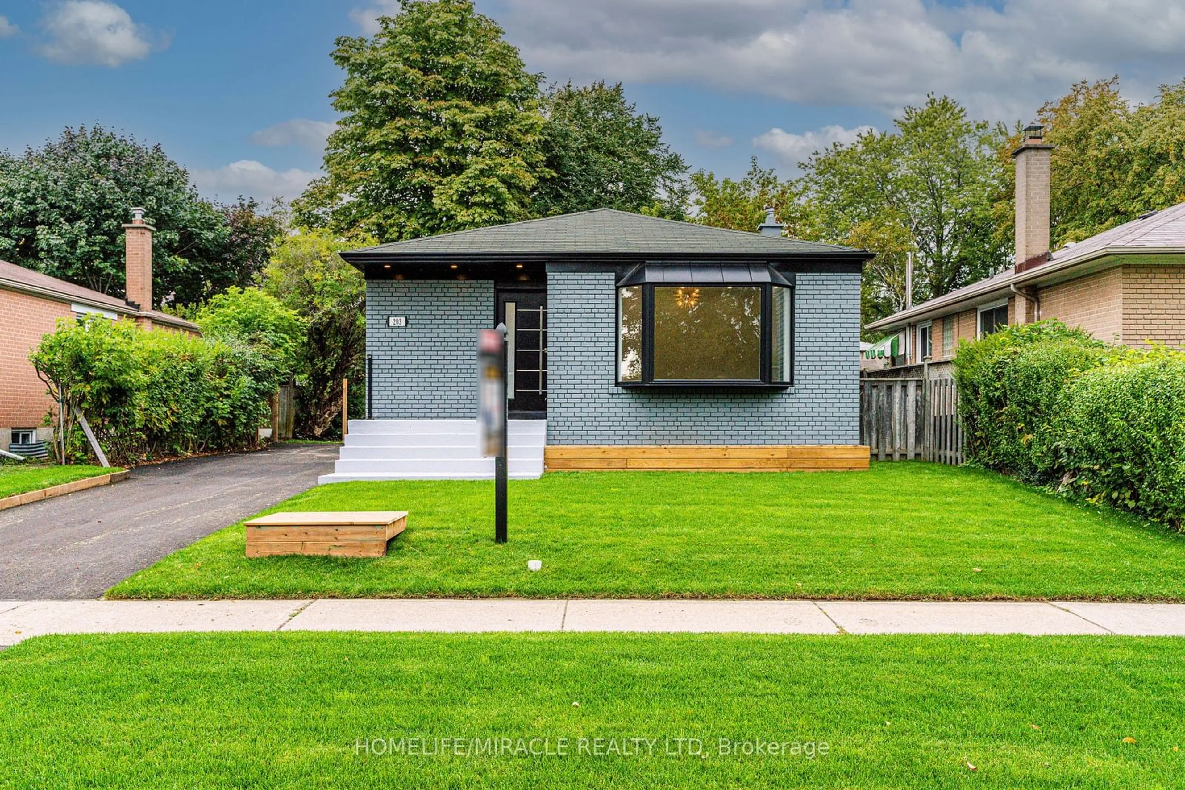 Home with vinyl exterior material, street for 203 Toynbee Tr, Toronto Ontario M1E 1G8