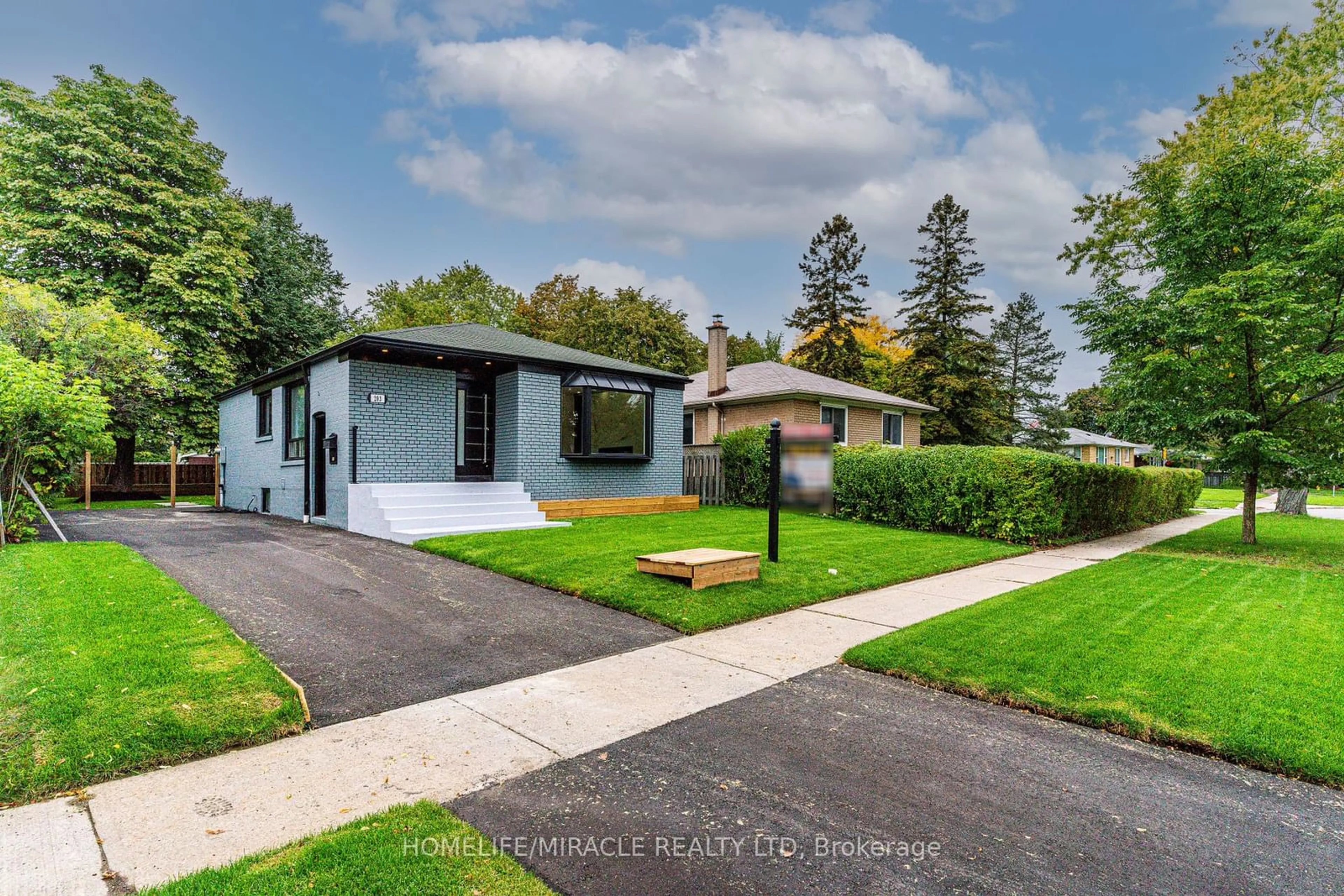 Home with vinyl exterior material, street for 203 Toynbee Tr, Toronto Ontario M1E 1G8