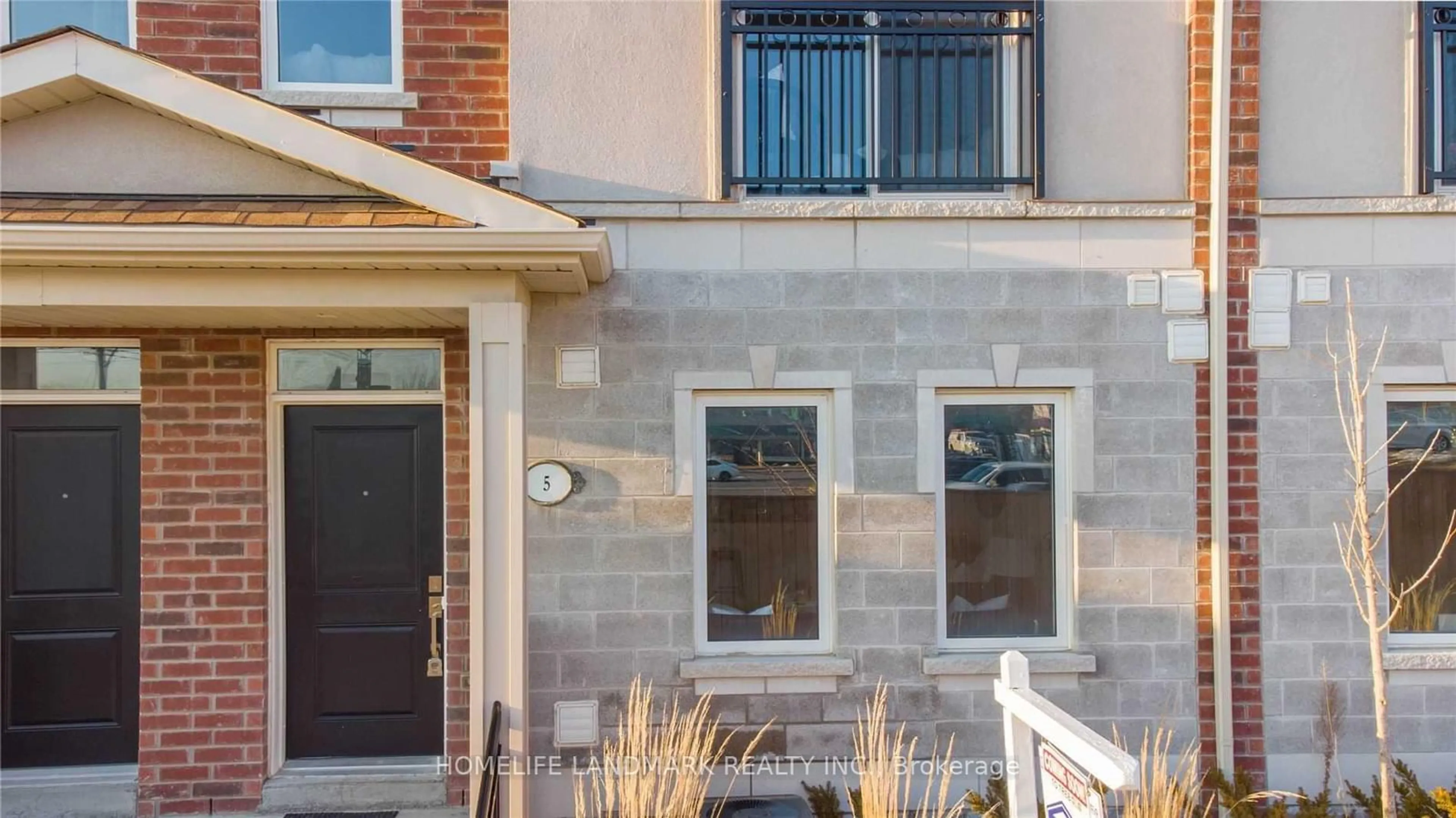 Home with brick exterior material, street for 1020 Dunsley Way #5, Whitby Ontario L1N 0L5