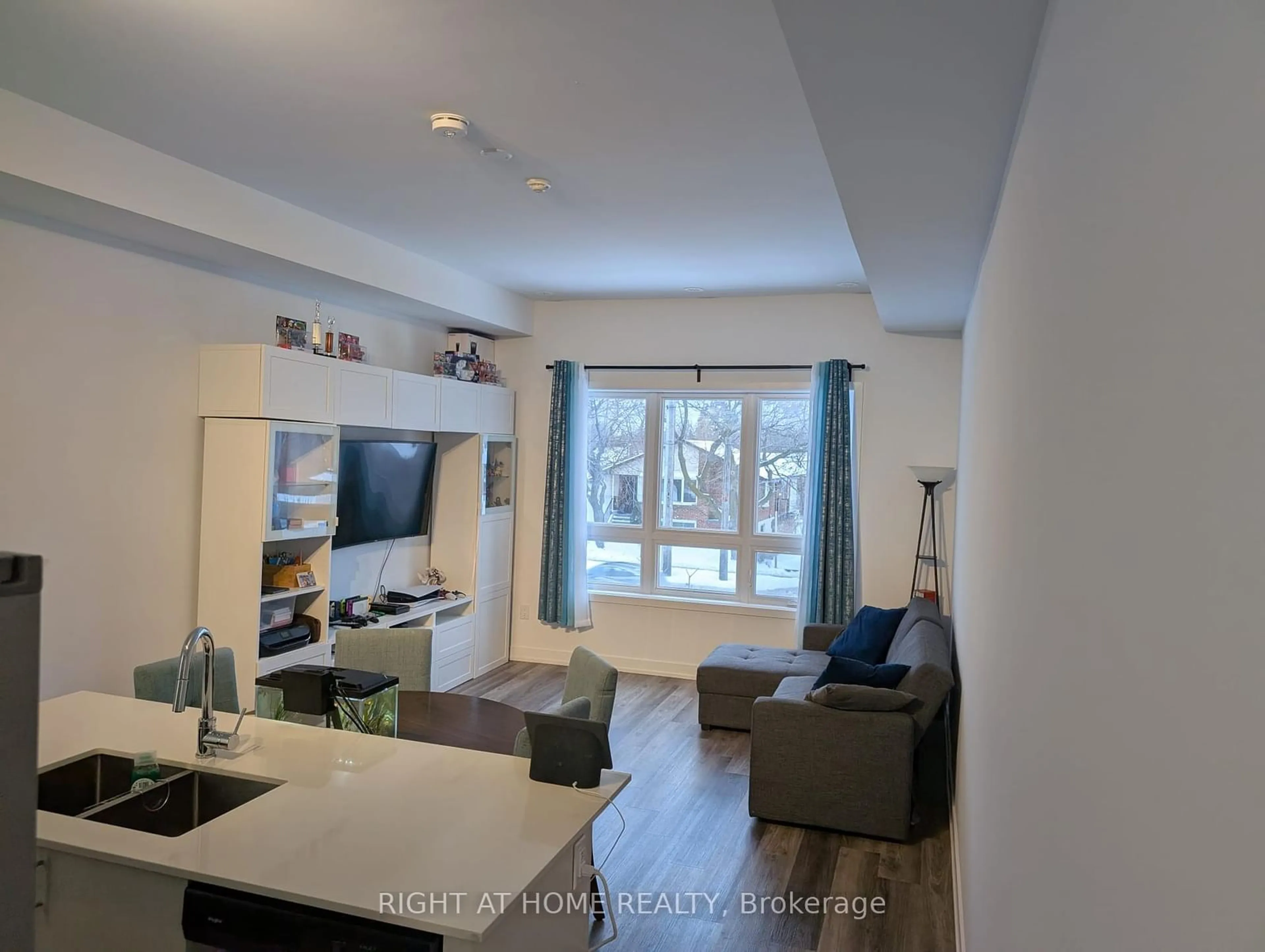 Living room with furniture, unknown for 3686 St Clair Ave #112, Toronto Ontario M1M 1T2