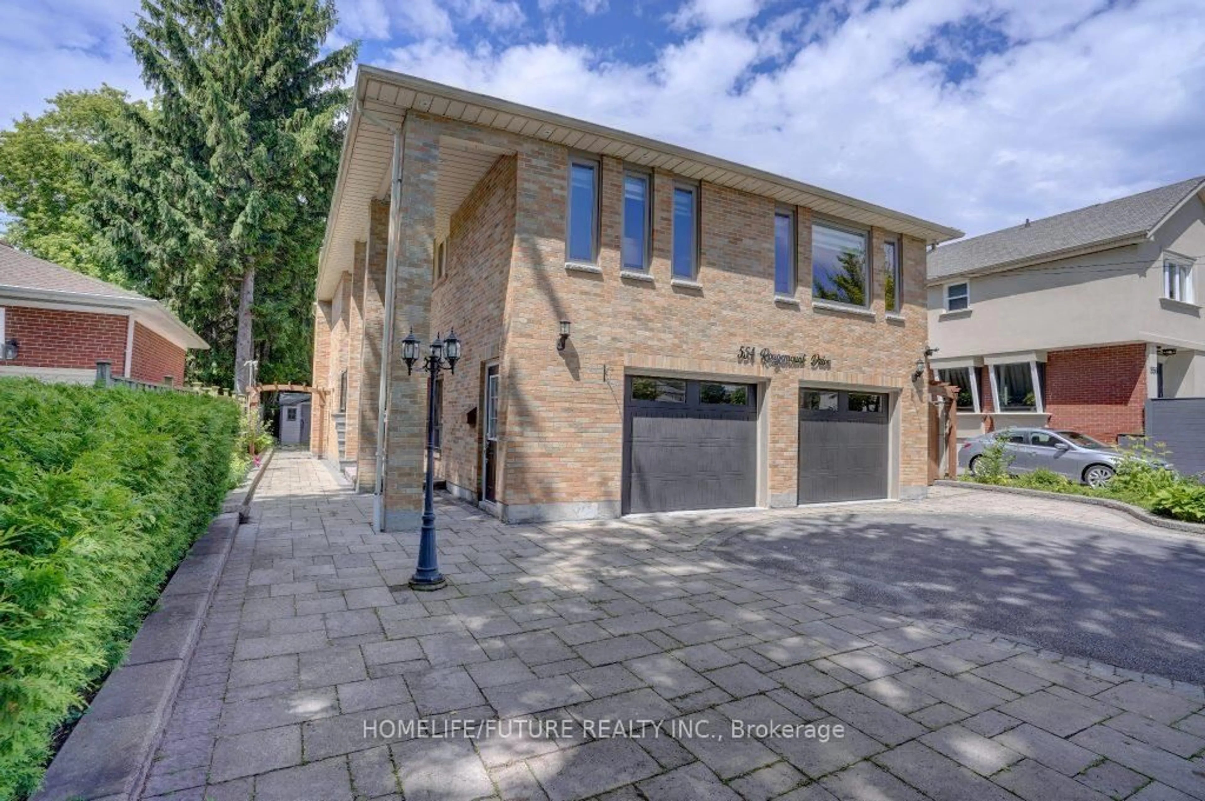 Home with brick exterior material, street for 554 Rougemount Dr, Pickering Ontario L1W 2C2