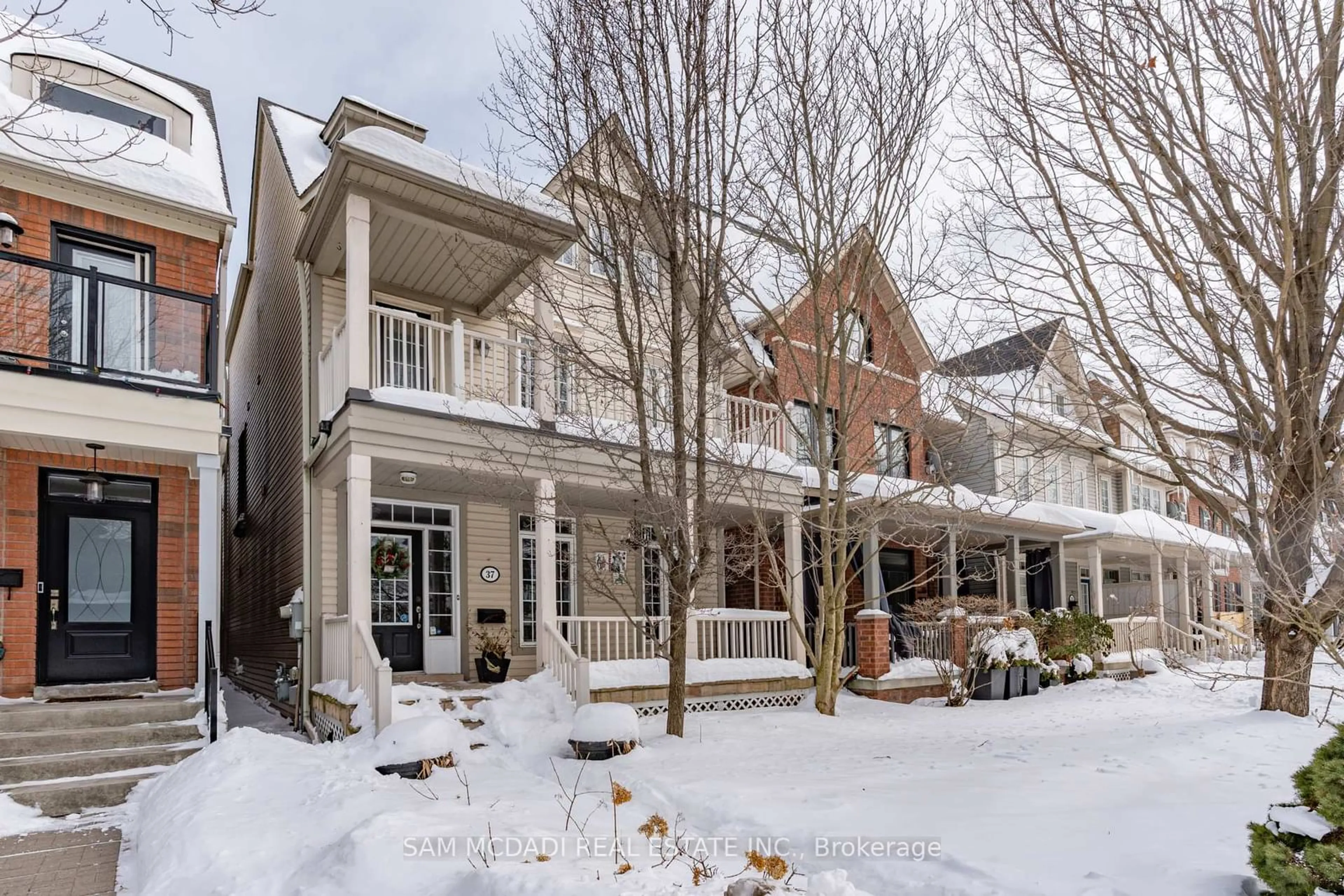 Home with brick exterior material, street for 37 Winners Circ, Toronto Ontario M4L 3Y7