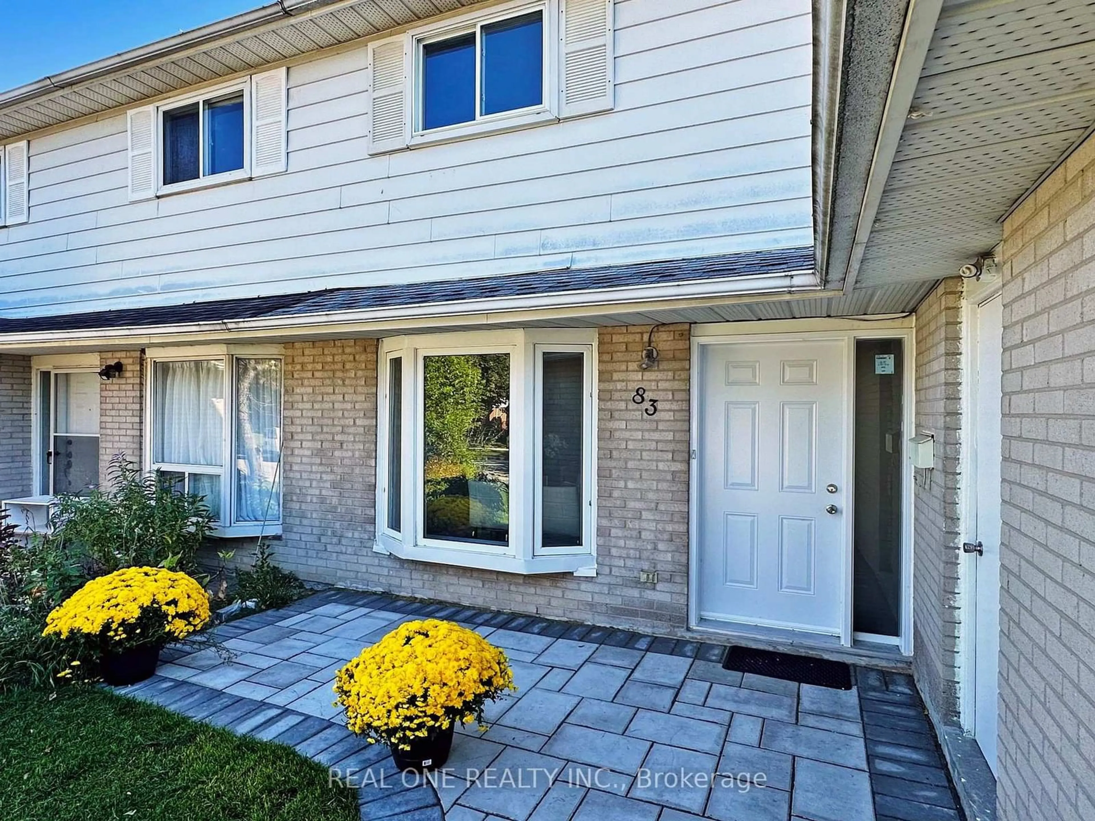 Home with vinyl exterior material, street for 83 Glen Springs Dr, Toronto Ontario M1W 1X7