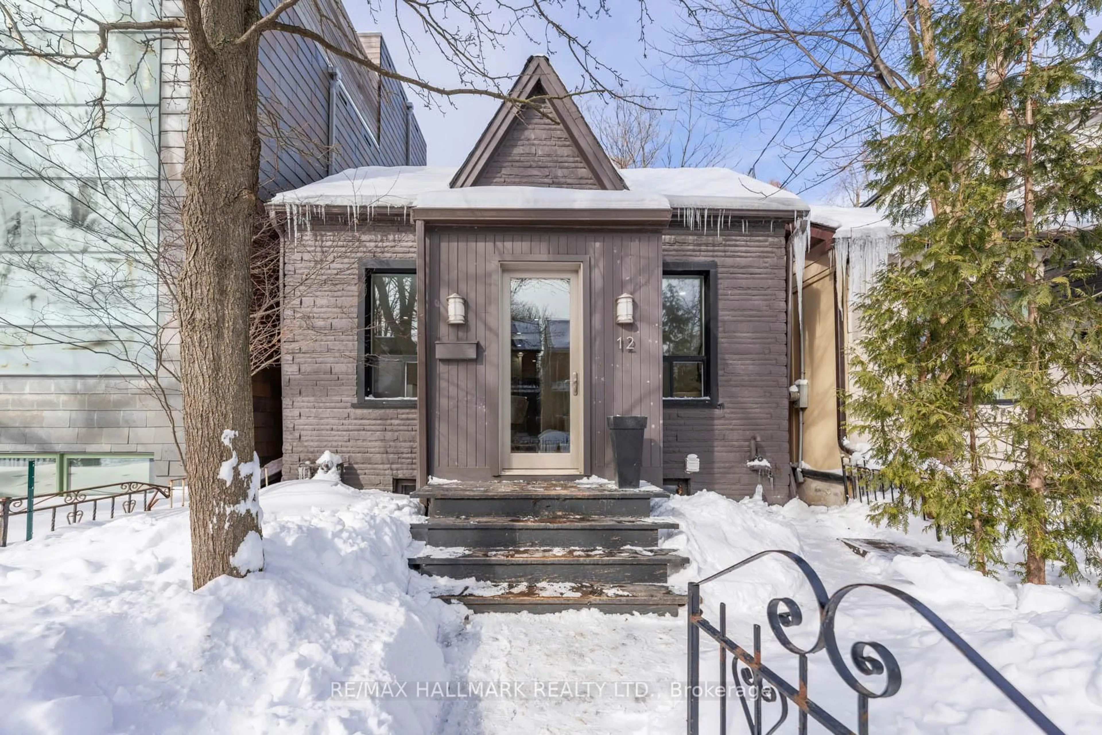 Home with brick exterior material, street for 12 Audley Ave, Toronto Ontario M4M 1P6