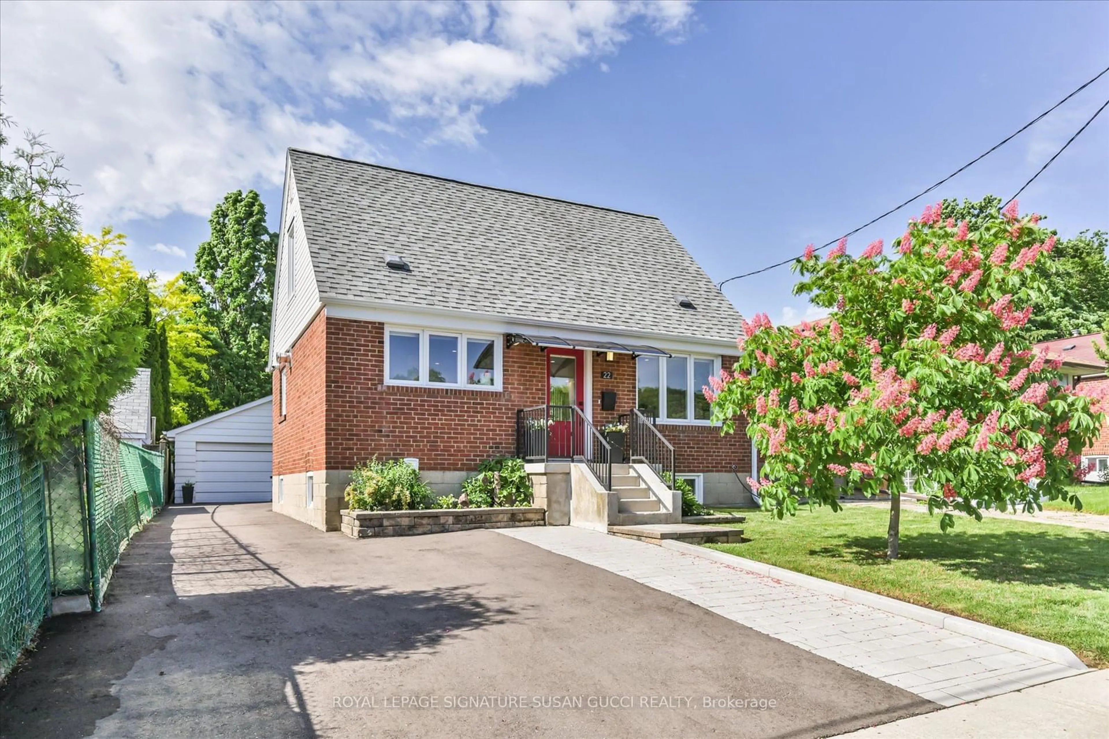 Home with brick exterior material, street for 22 Donora Dr, Toronto Ontario M4B 1B5