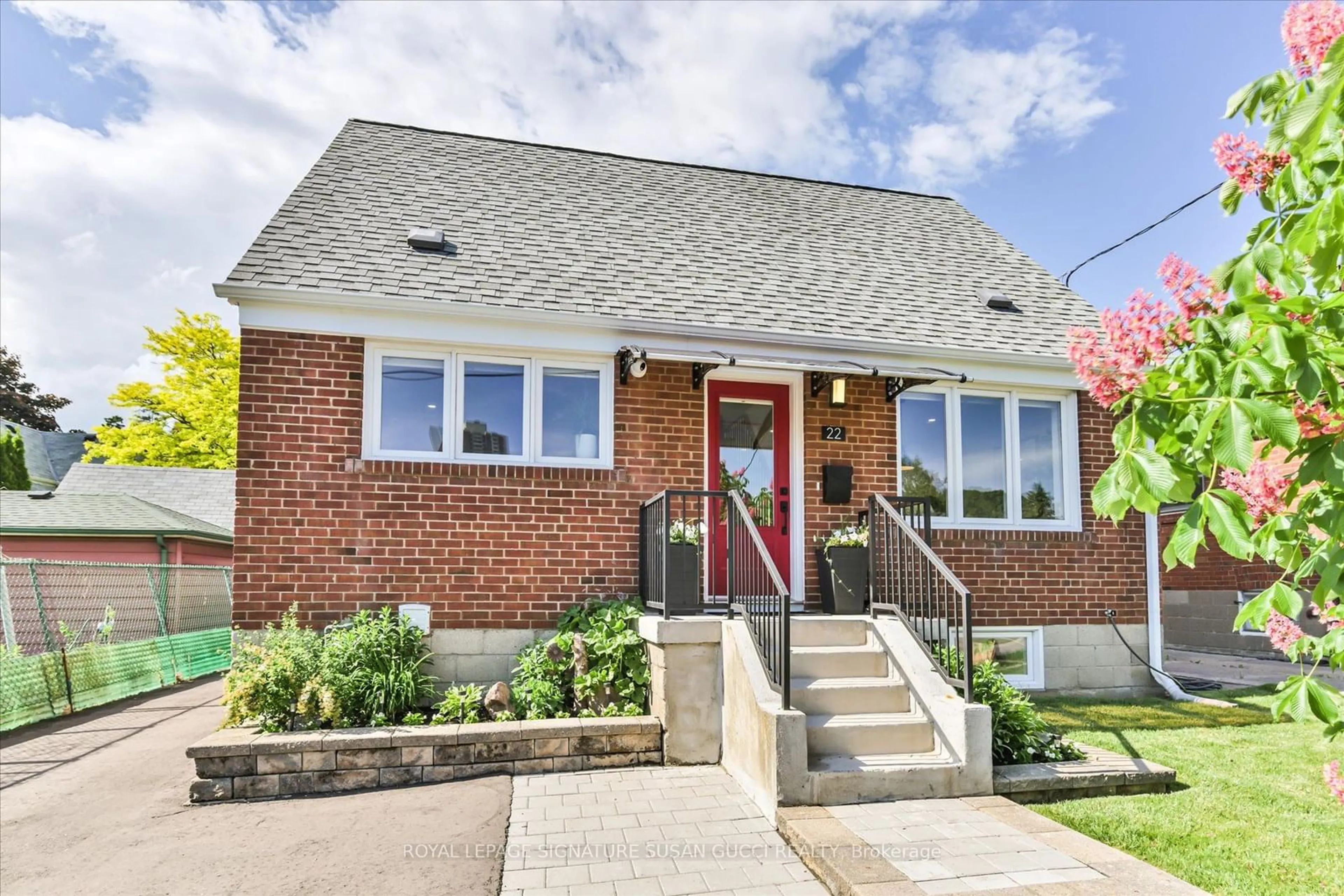 Home with brick exterior material, street for 22 Donora Dr, Toronto Ontario M4B 1B5