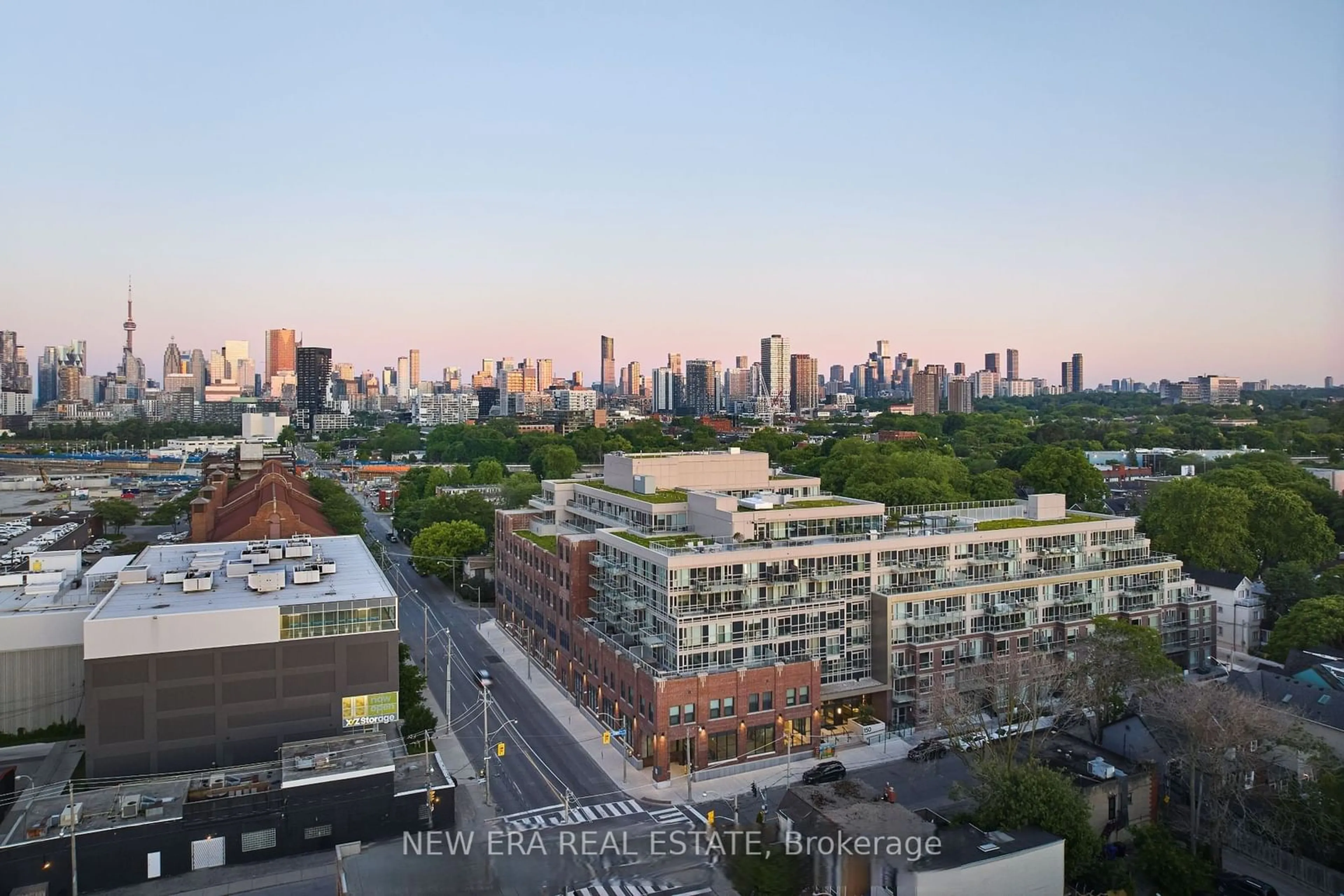 A pic from outside/outdoor area/front of a property/back of a property/a pic from drone, city buildings view from balcony for 150 Logan Ave #301, Toronto Ontario M4M 0E4