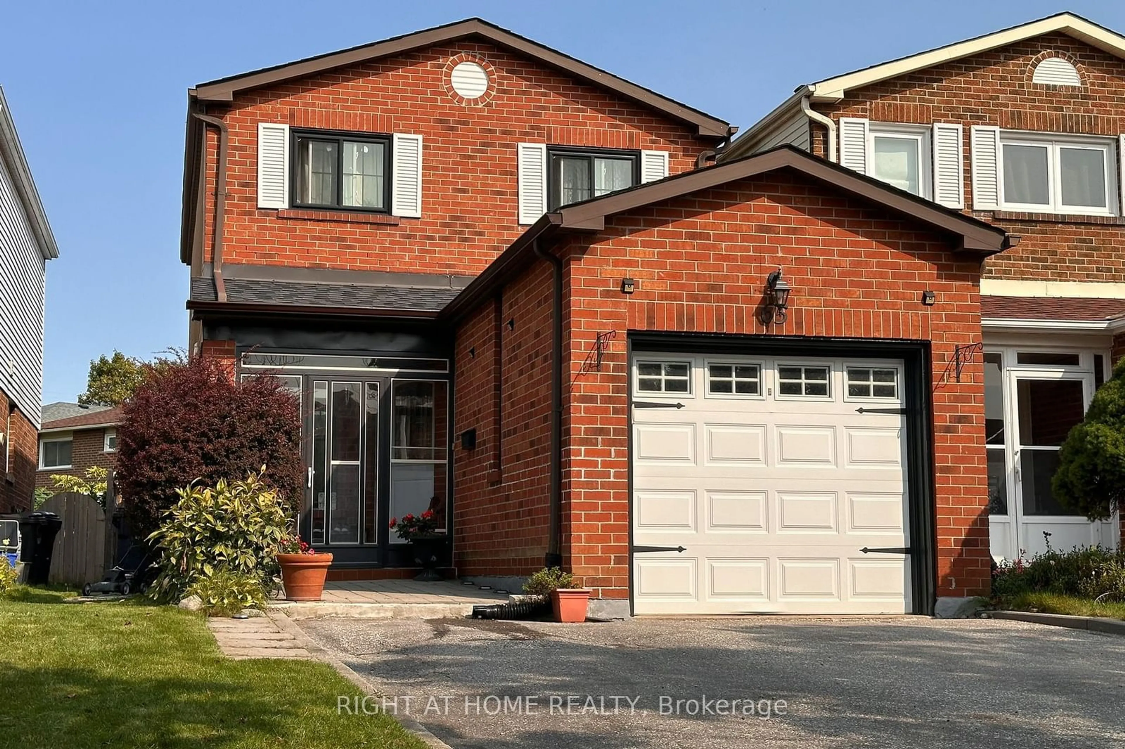 Home with brick exterior material, street for 65 Longsword Dr, Toronto Ontario M1V 3A1