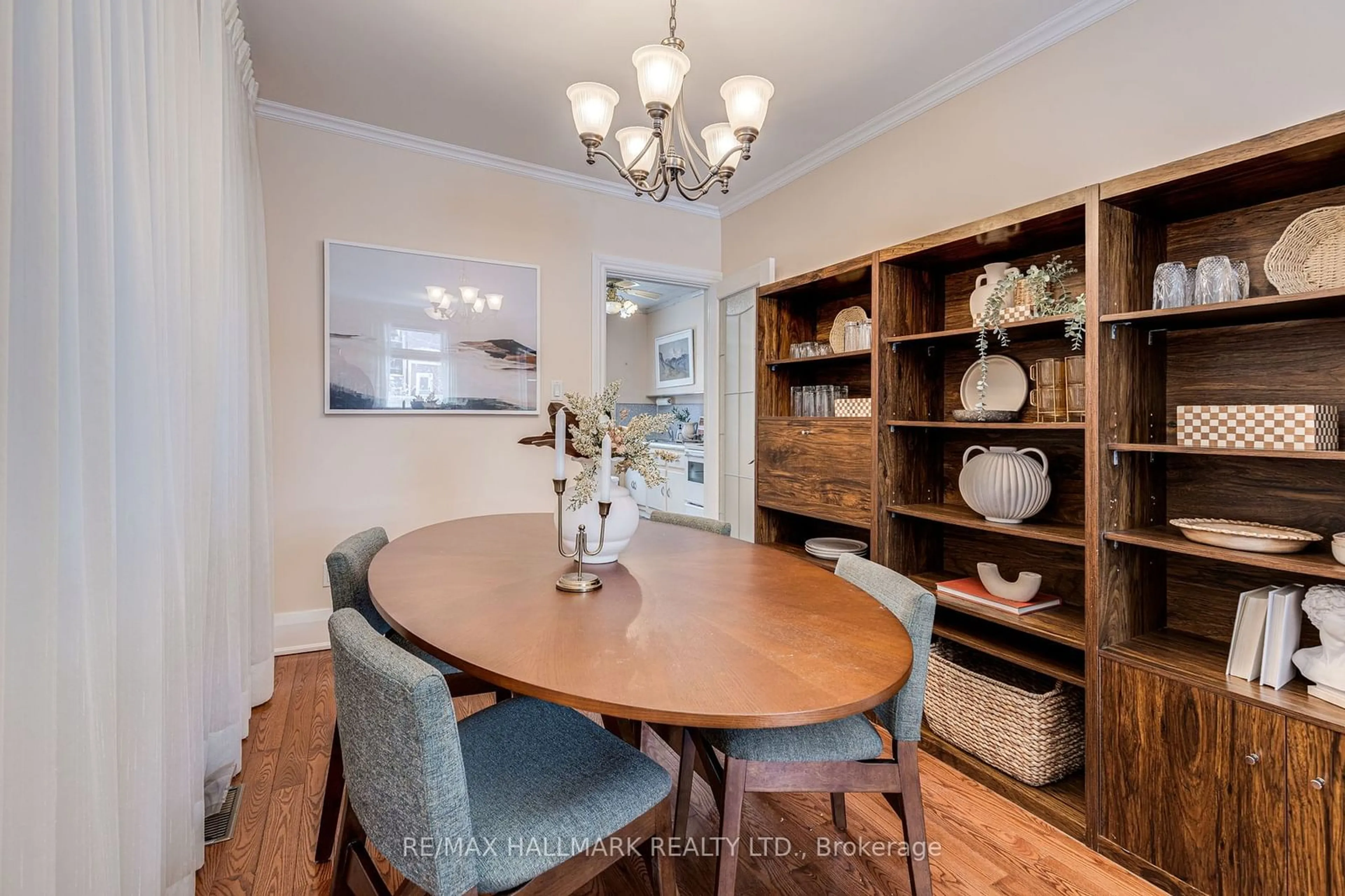 Dining room, wood/laminate floor for 148 Mountjoy Ave, Toronto Ontario M4J 1K2