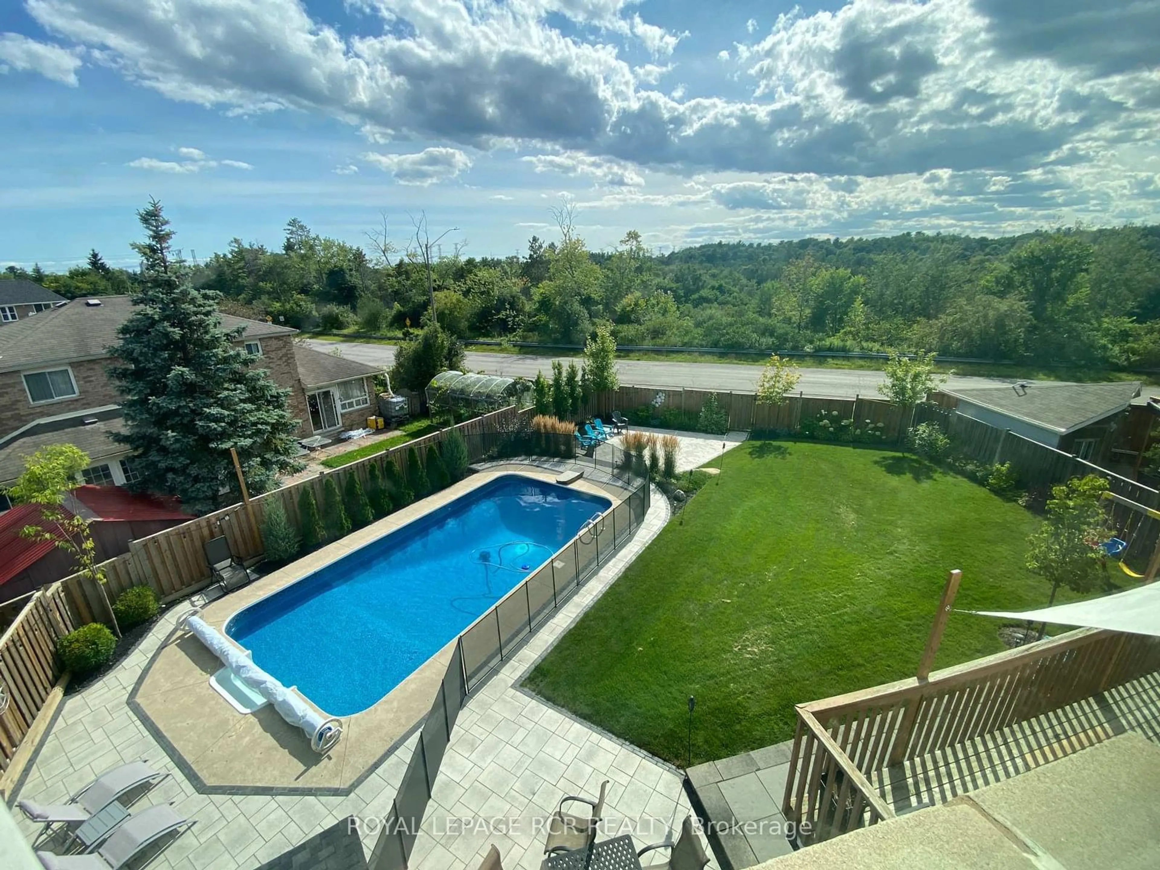 A pic from outside/outdoor area/front of a property/back of a property/a pic from drone, water/lake/river/ocean view for 1575 Somergrove Cres, Pickering Ontario L1X 2J5