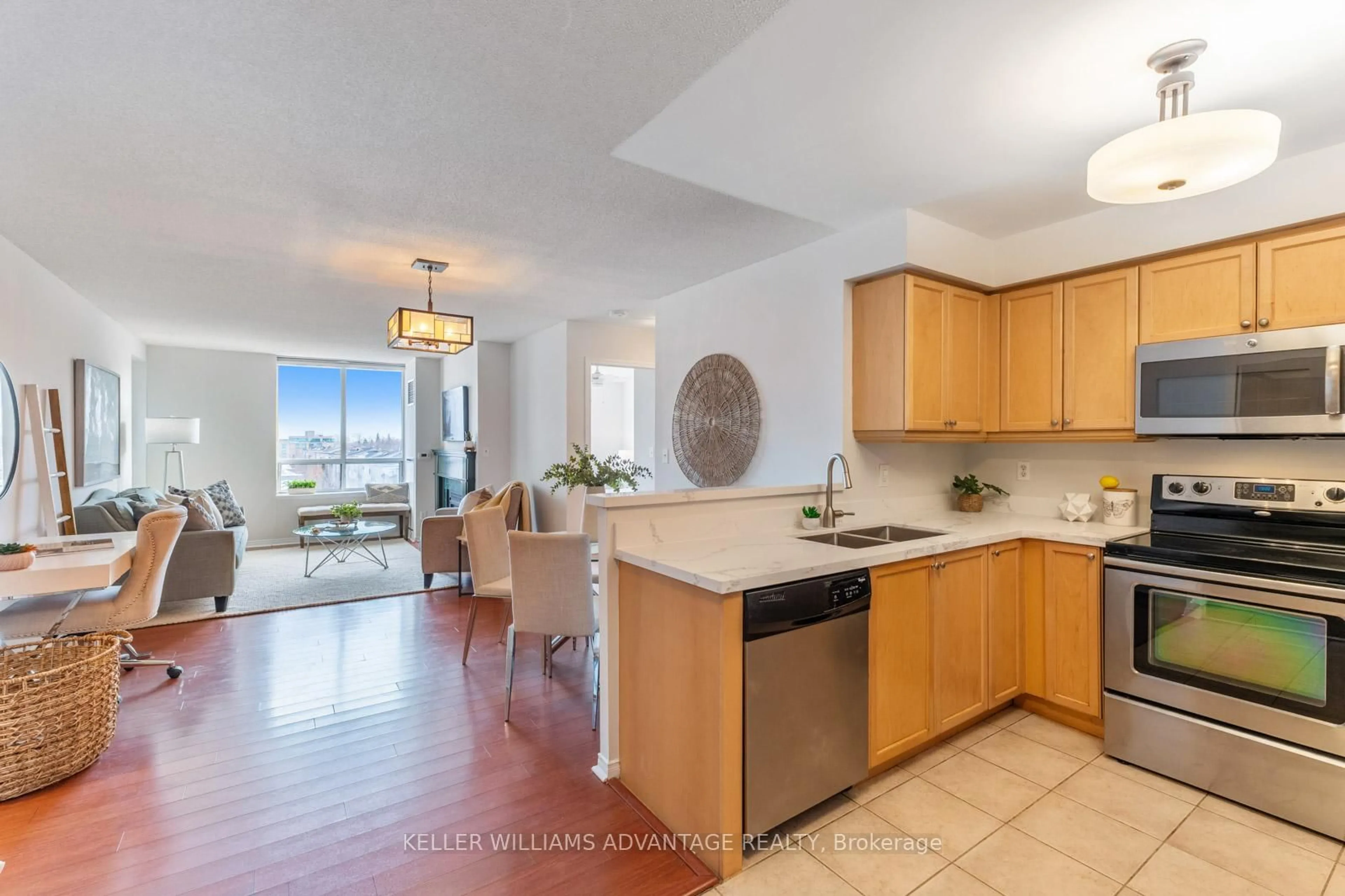 Open concept kitchen, ceramic/tile floor for 1733 Queen St #522, Toronto Ontario M4L 6S9