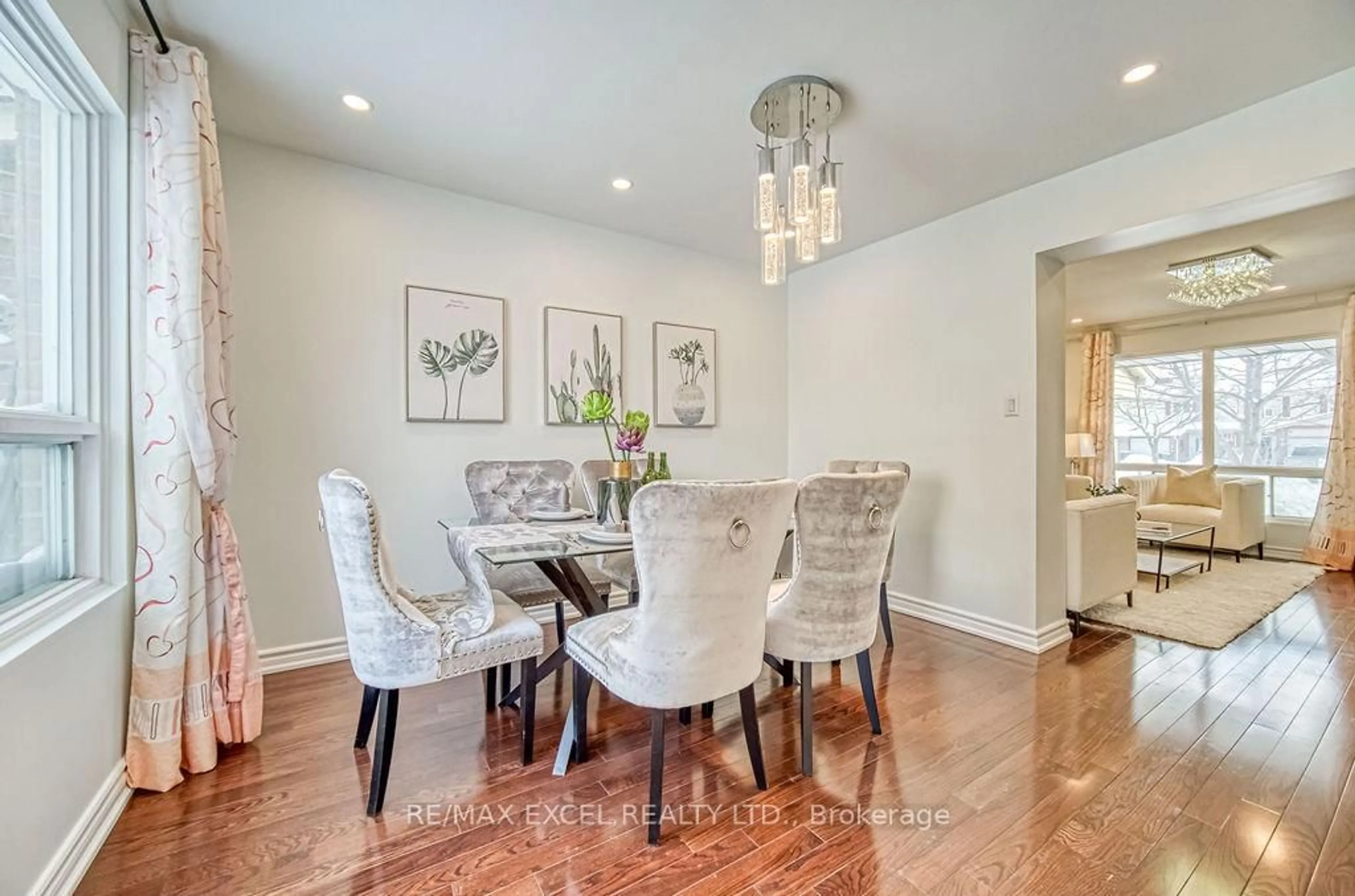 Dining room, wood/laminate floor for 11 Truro Cres, Toronto Ontario M1V 2H7