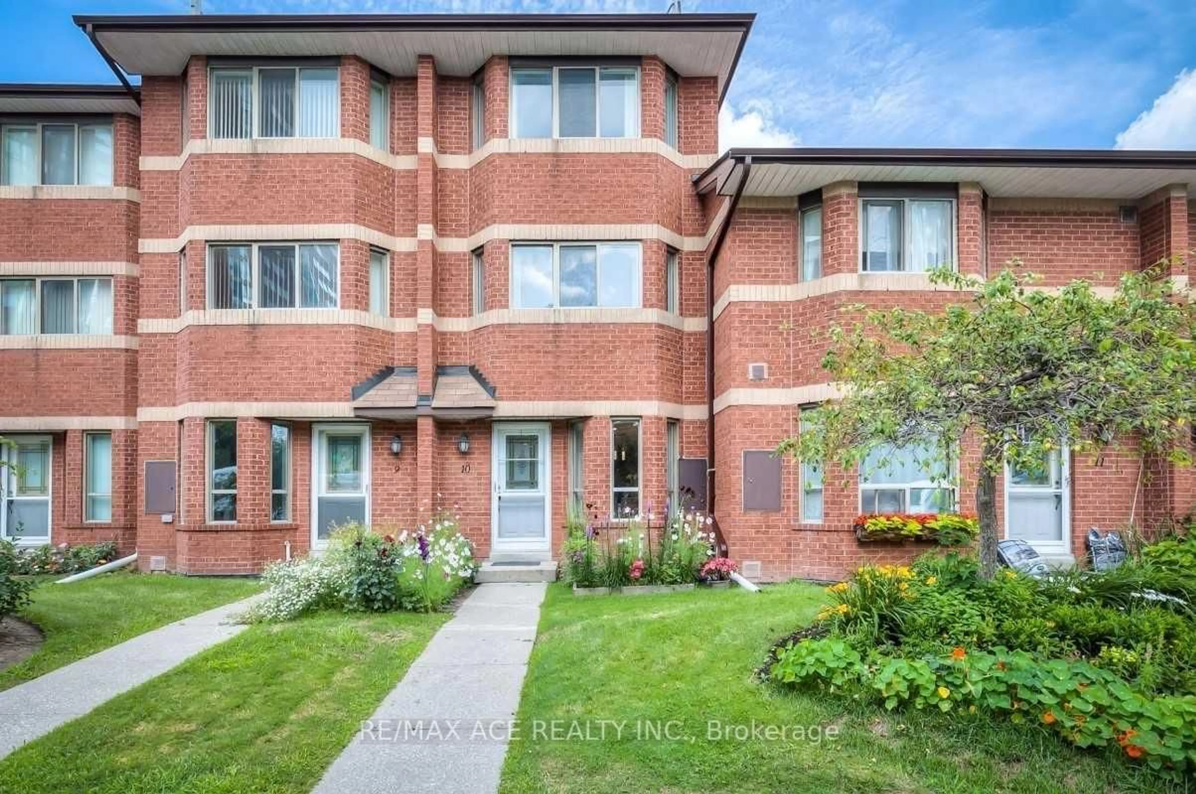 Home with brick exterior material, street for 2472 Eglinton Ave #TH10, Toronto Ontario M1K 5J9