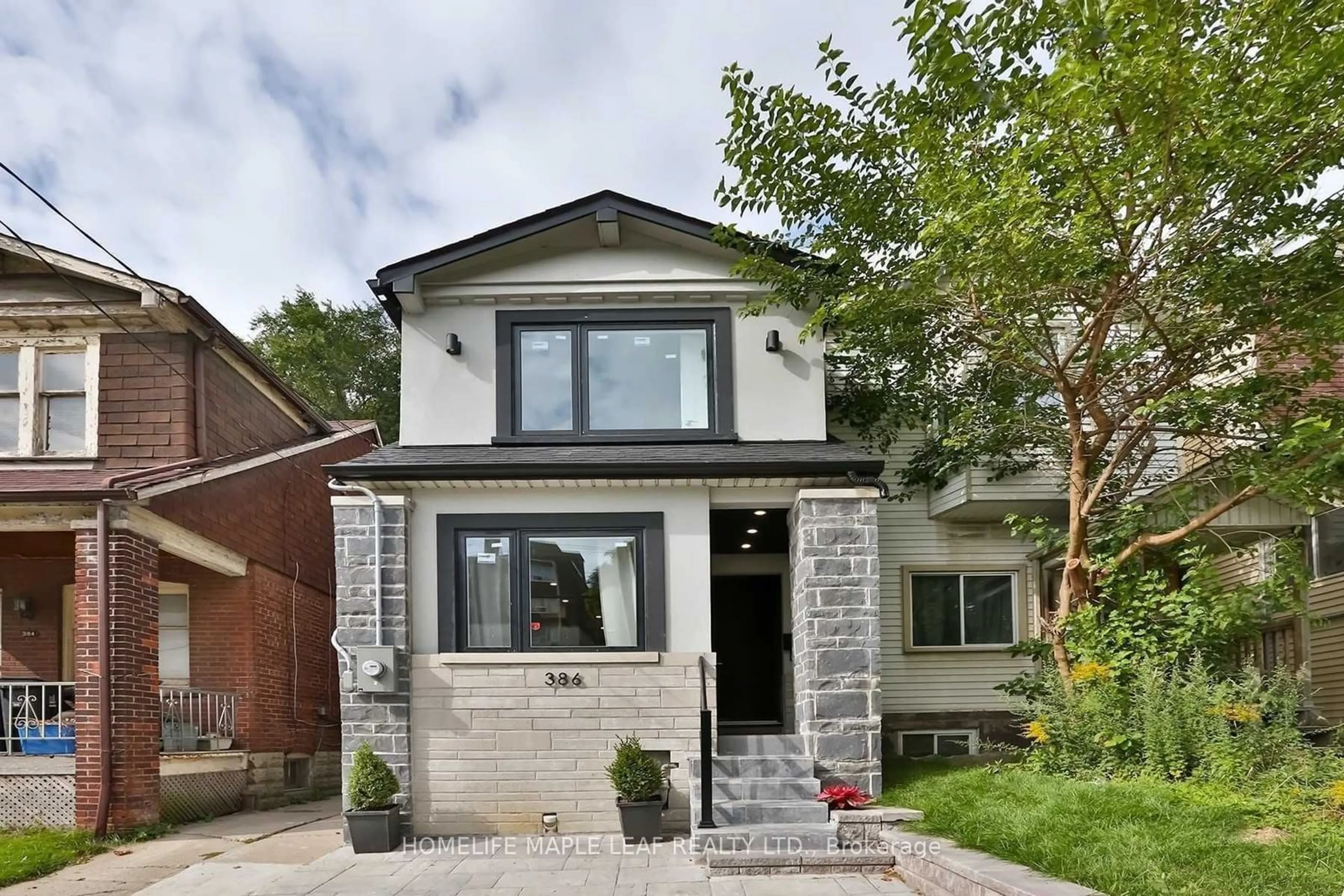 Home with brick exterior material, street for 386 Coxwell Ave, Toronto Ontario M4L 3B7