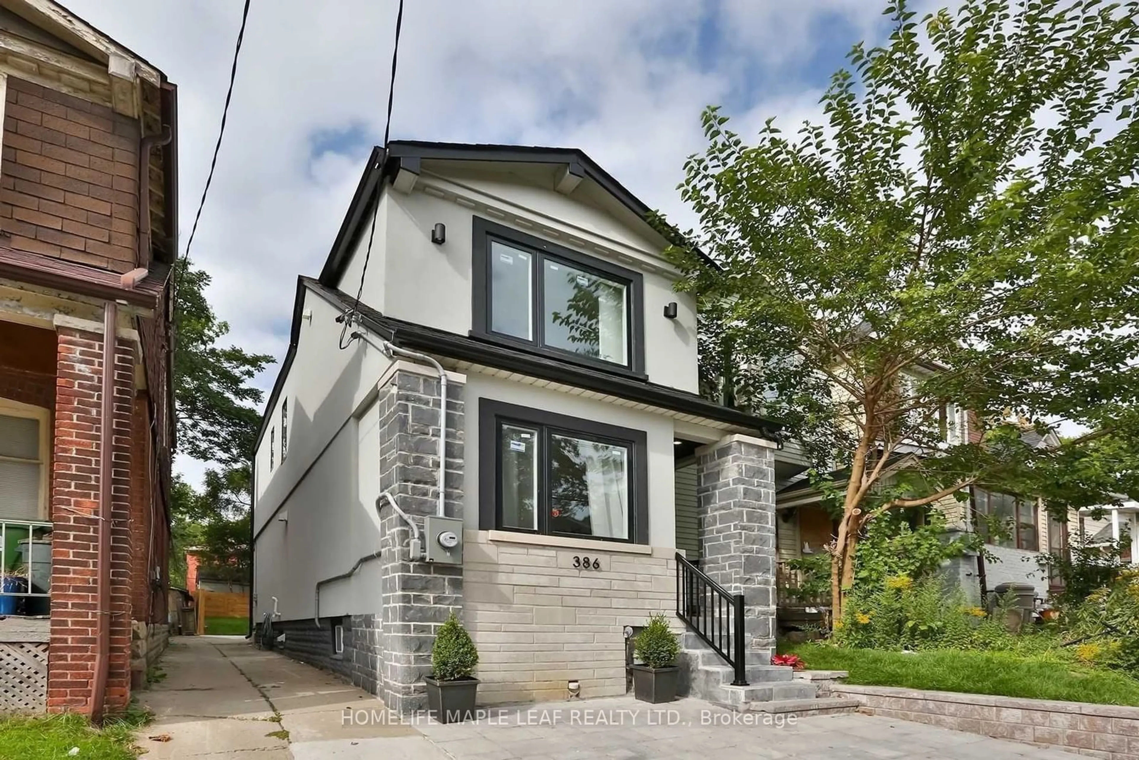 Home with brick exterior material, street for 386 Coxwell Ave, Toronto Ontario M4L 3B7