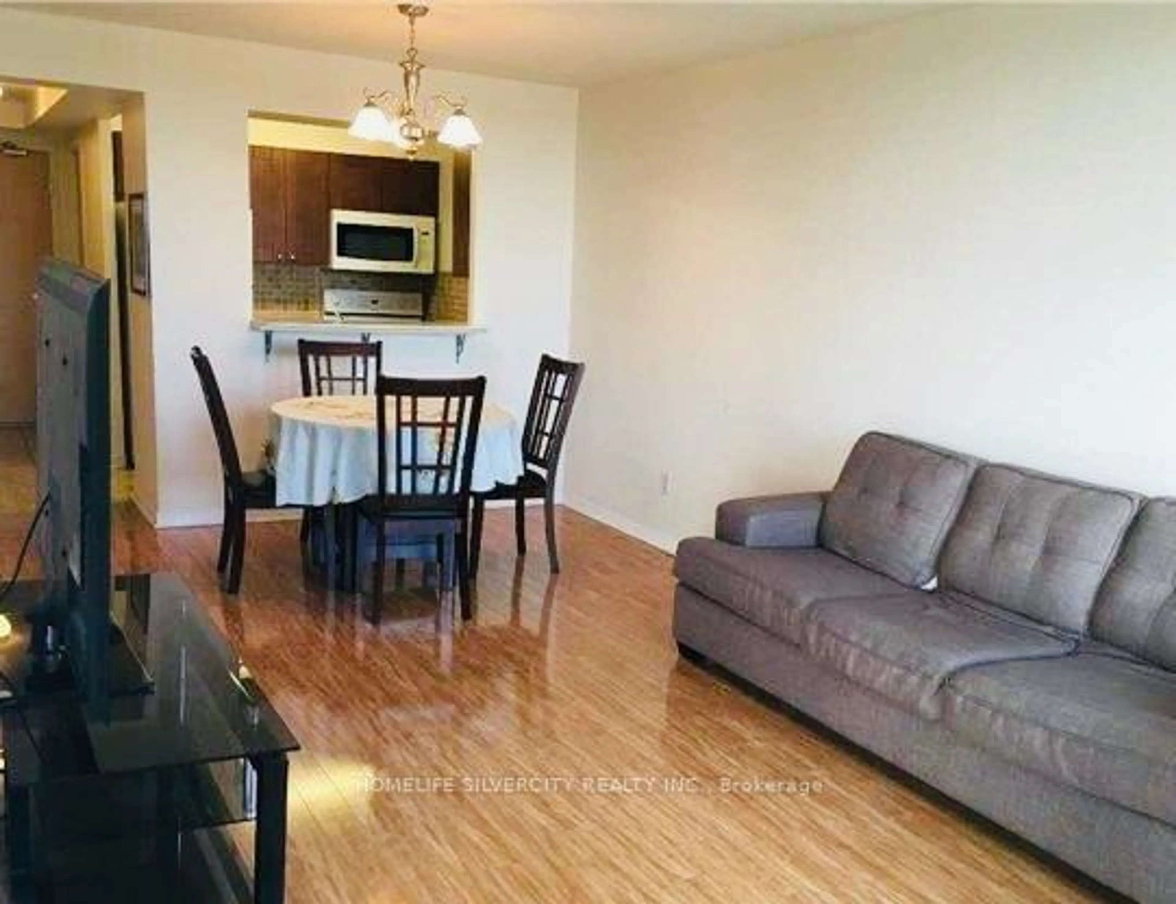 Living room with furniture, wood/laminate floor for 1655 Pickering Pkwy #510, Pickering Ontario L1V 6L3