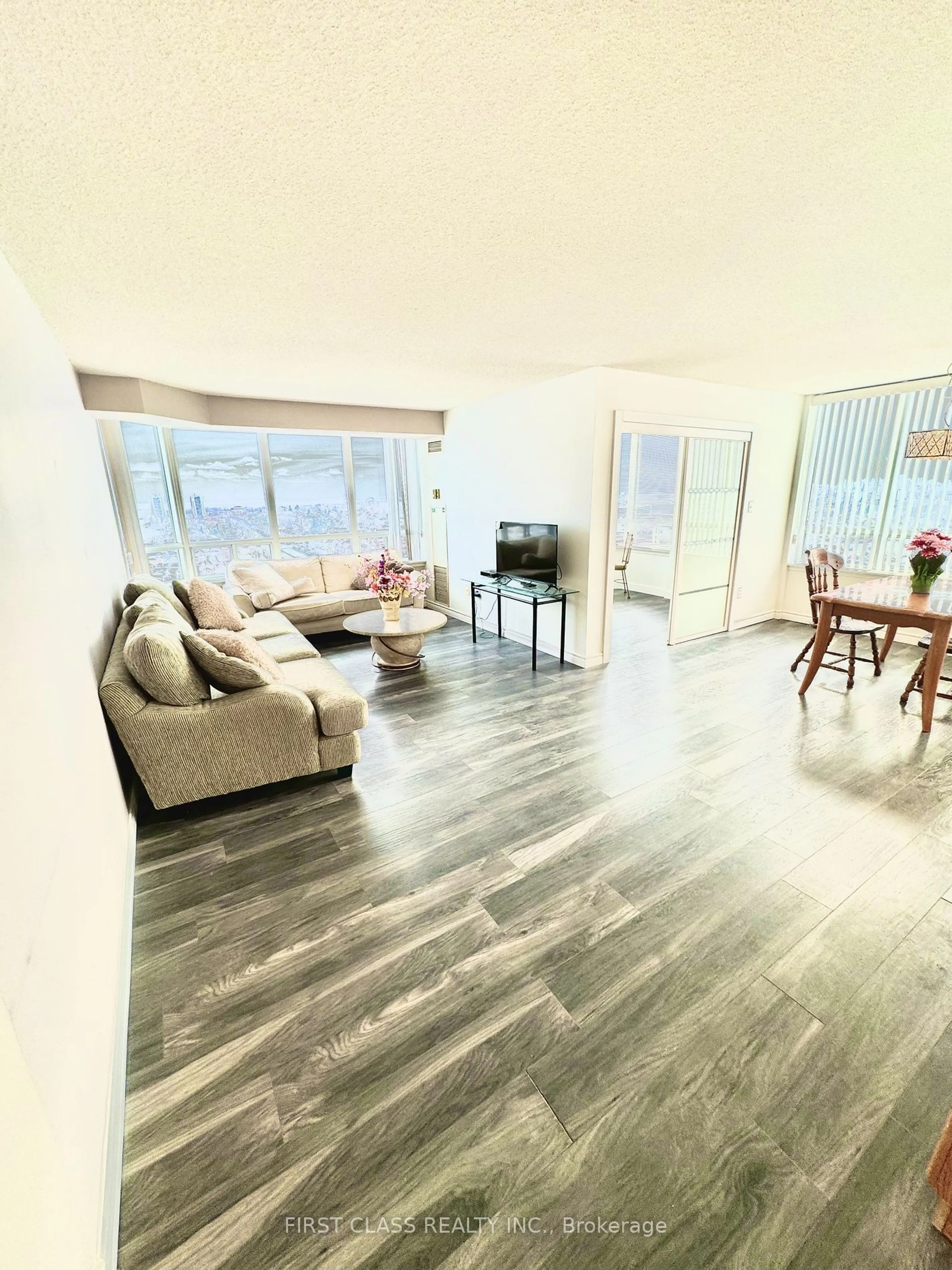 Living room with furniture, wood/laminate floor for 1 Greystone Walk Dr #1789, Toronto Ontario M1K 5J3