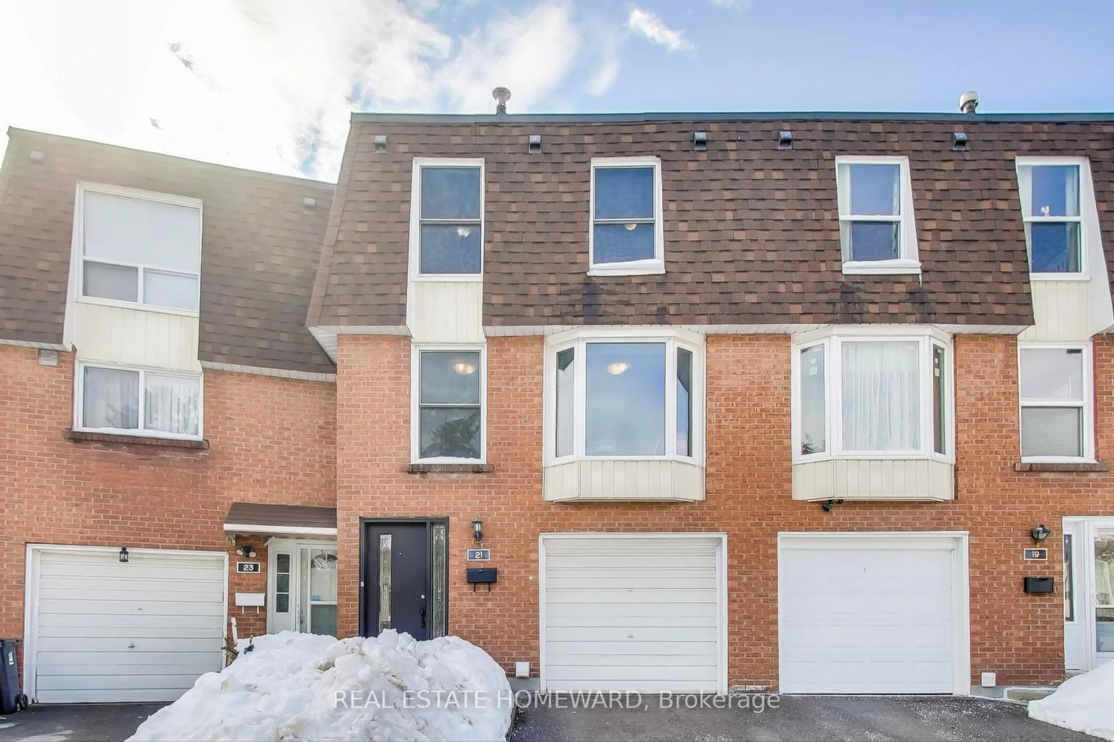 Home with brick exterior material, street for 301 Bridletowne Circ #21, Toronto Ontario M1W 2H7