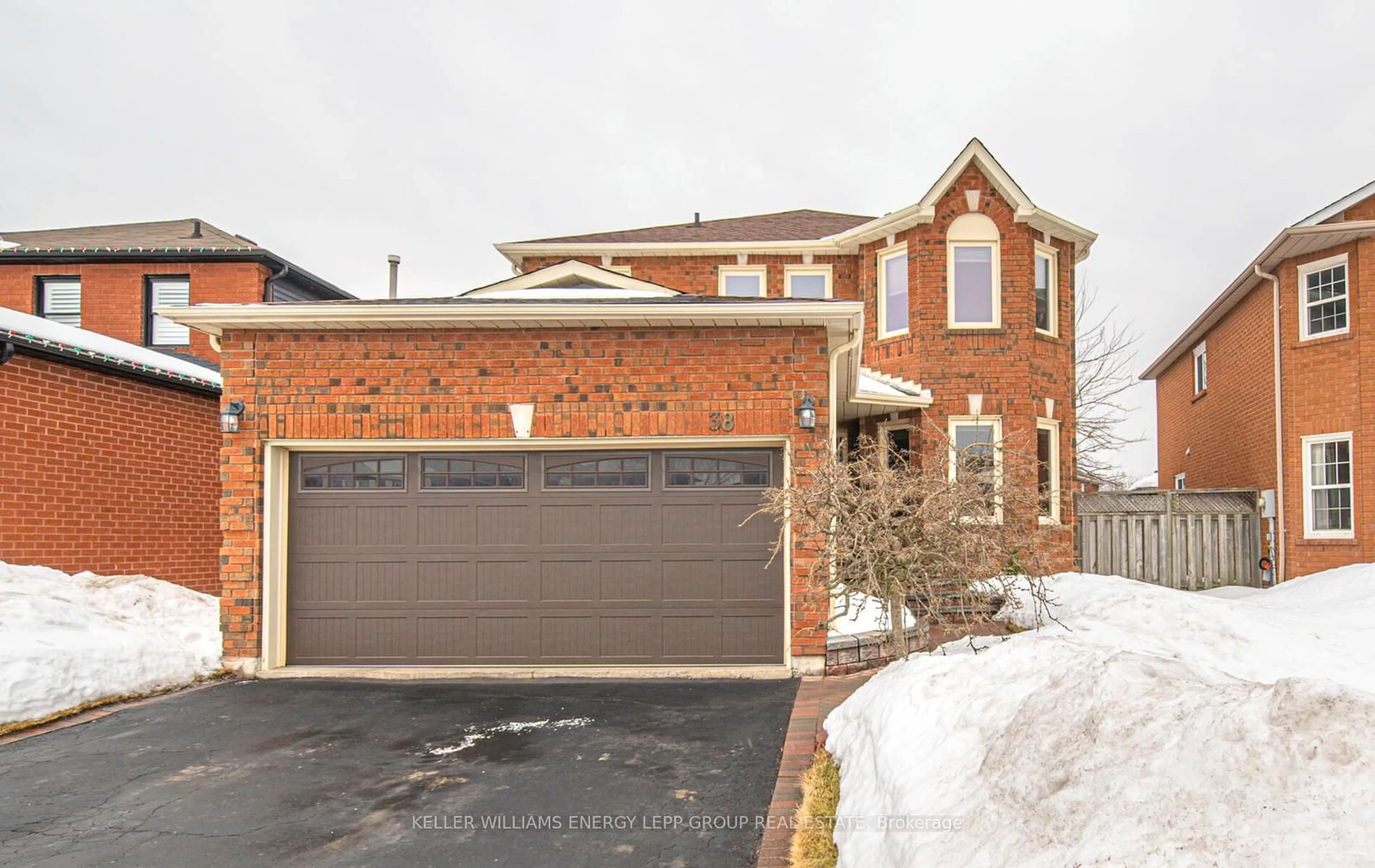 Home with brick exterior material, street for 38 Fencerow Dr, Whitby Ontario L1R 1Y4