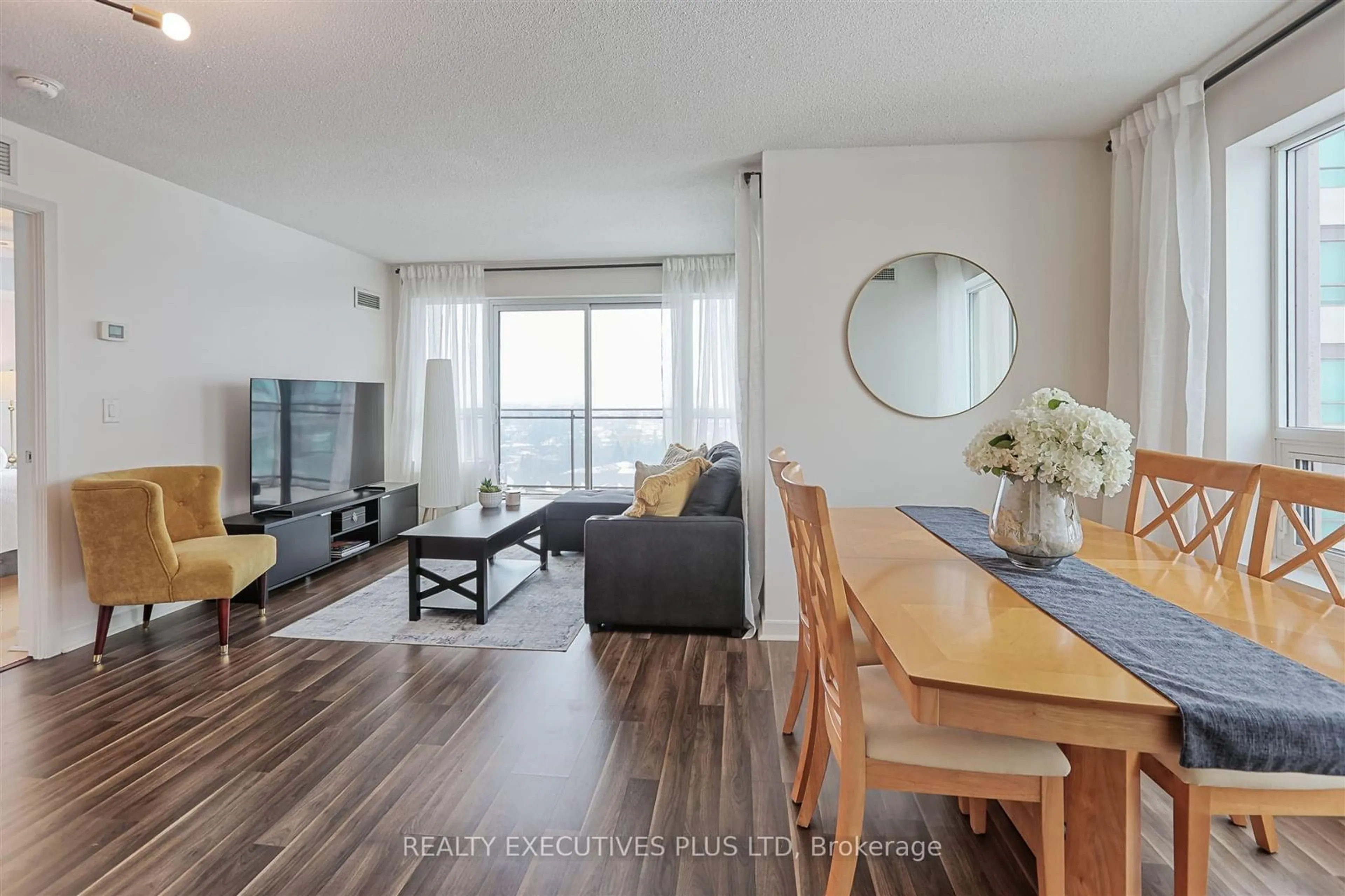 Living room with furniture, wood/laminate floor for 1235 Bayly St #1102, Pickering Ontario L1W 1L7