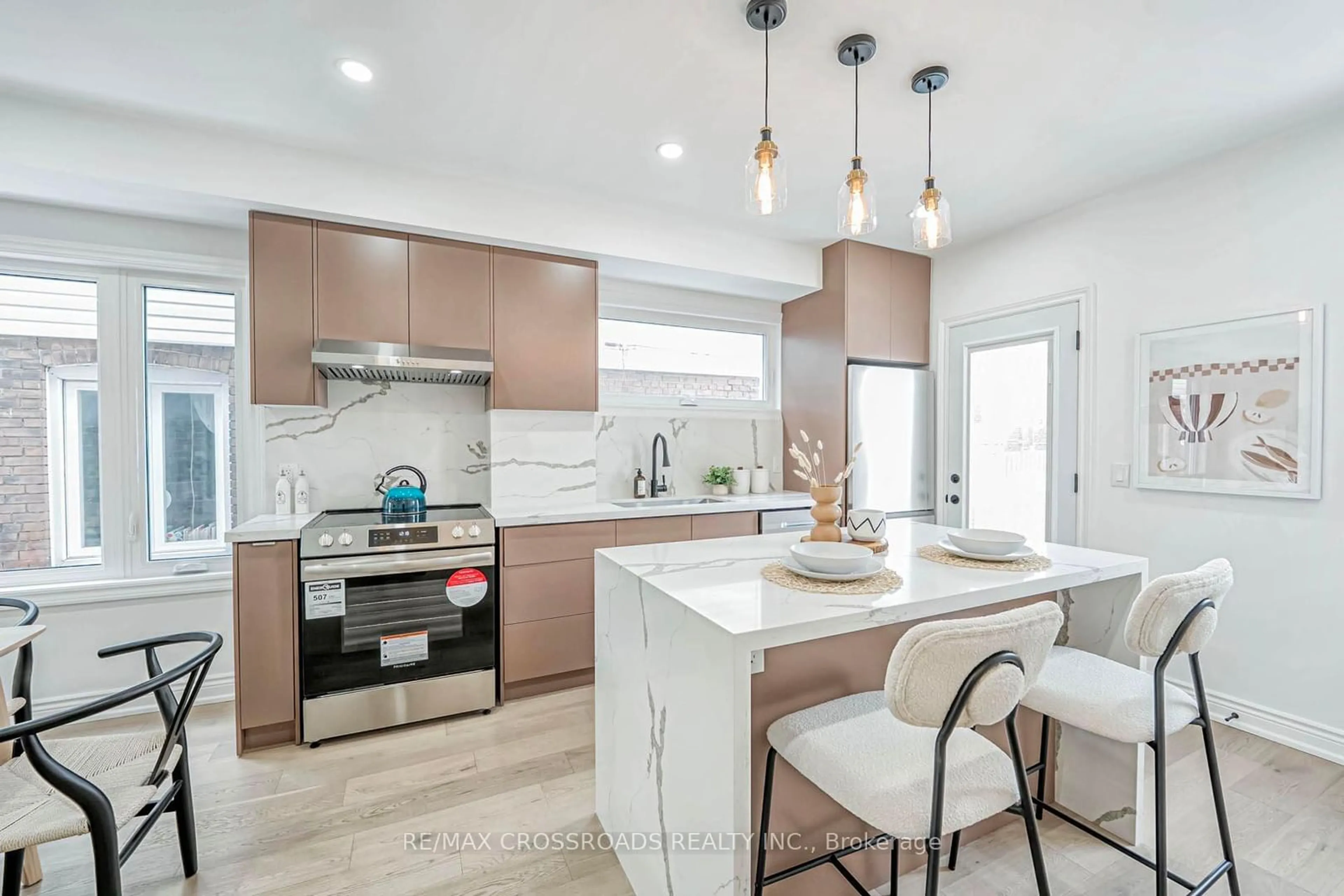 Open concept kitchen, ceramic/tile floor for 548 Glebeholme Blvd, Toronto Ontario M4C 1V4