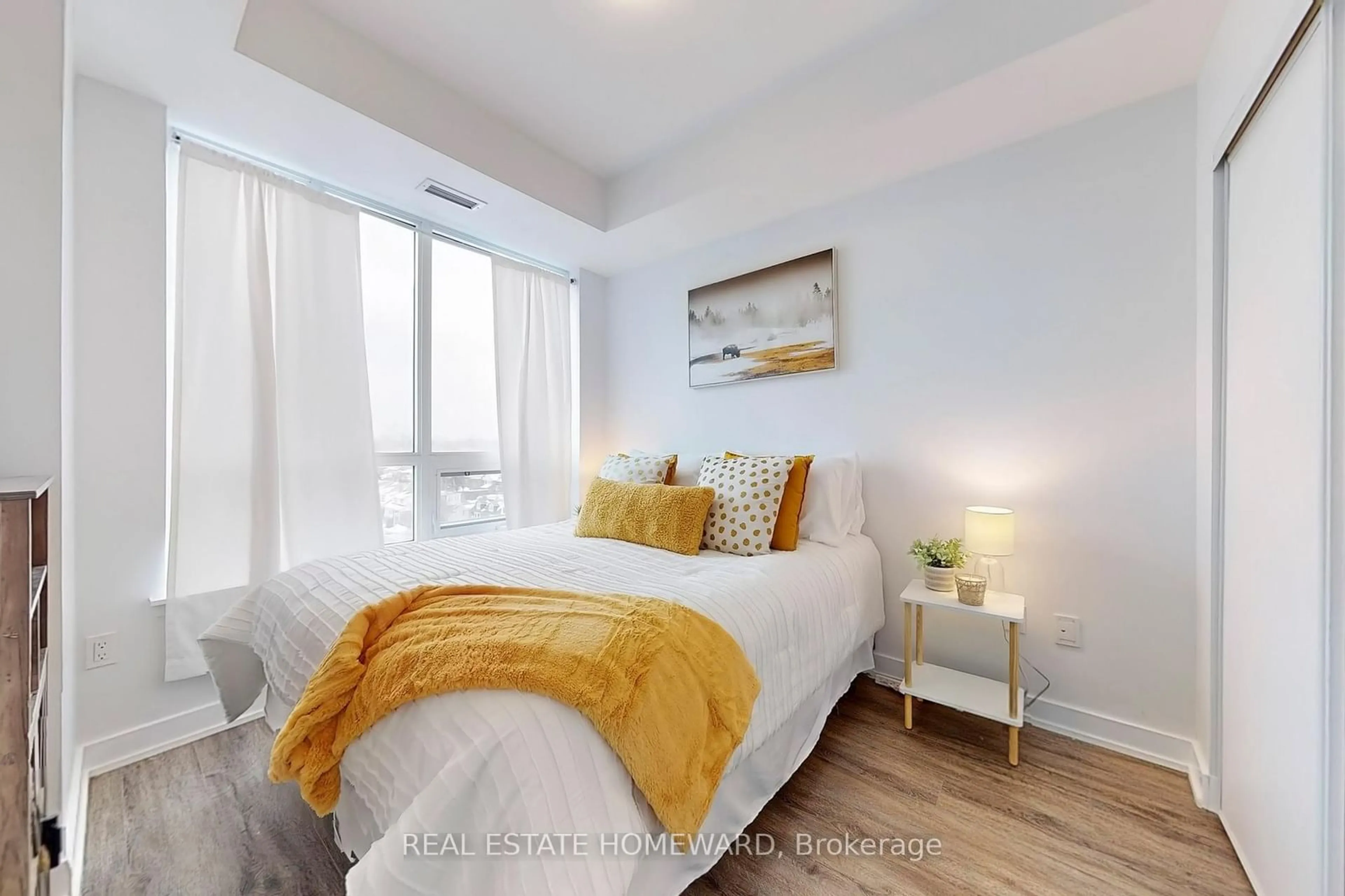 Bedroom with bed, wood/laminate floor for 630 Greenwood Ave #707, Toronto Ontario M4J 0A8