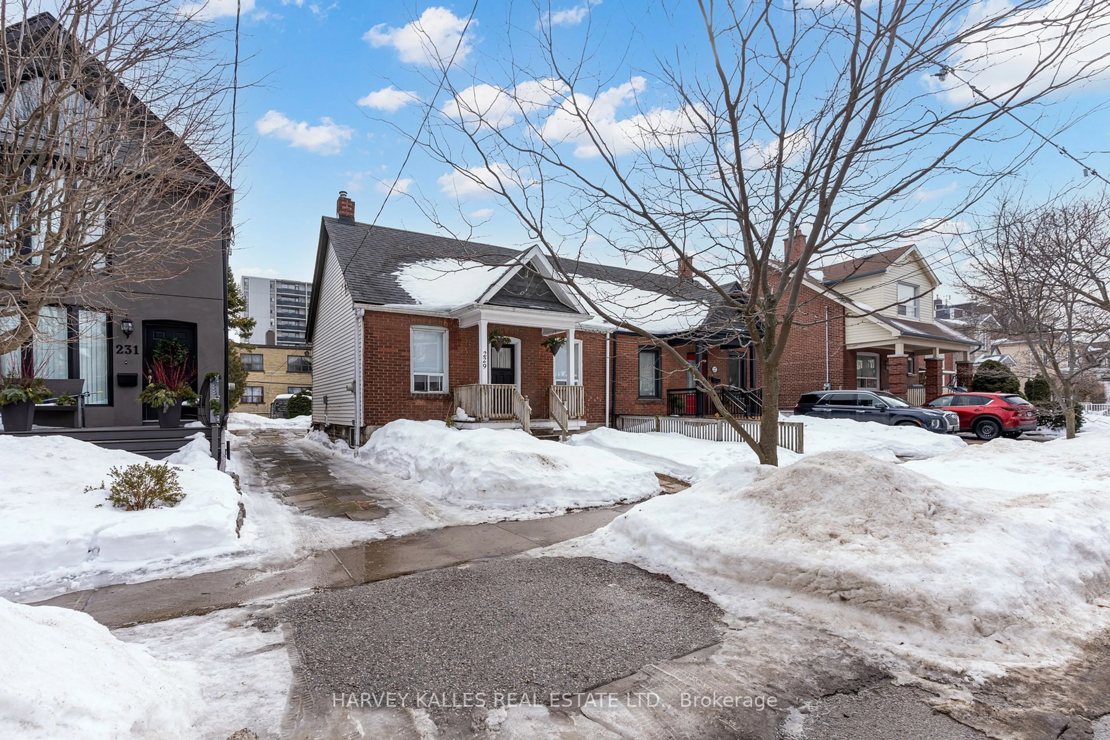 Home with brick exterior material, street for 229 Gamble Ave, Toronto Ontario M4J 2P4