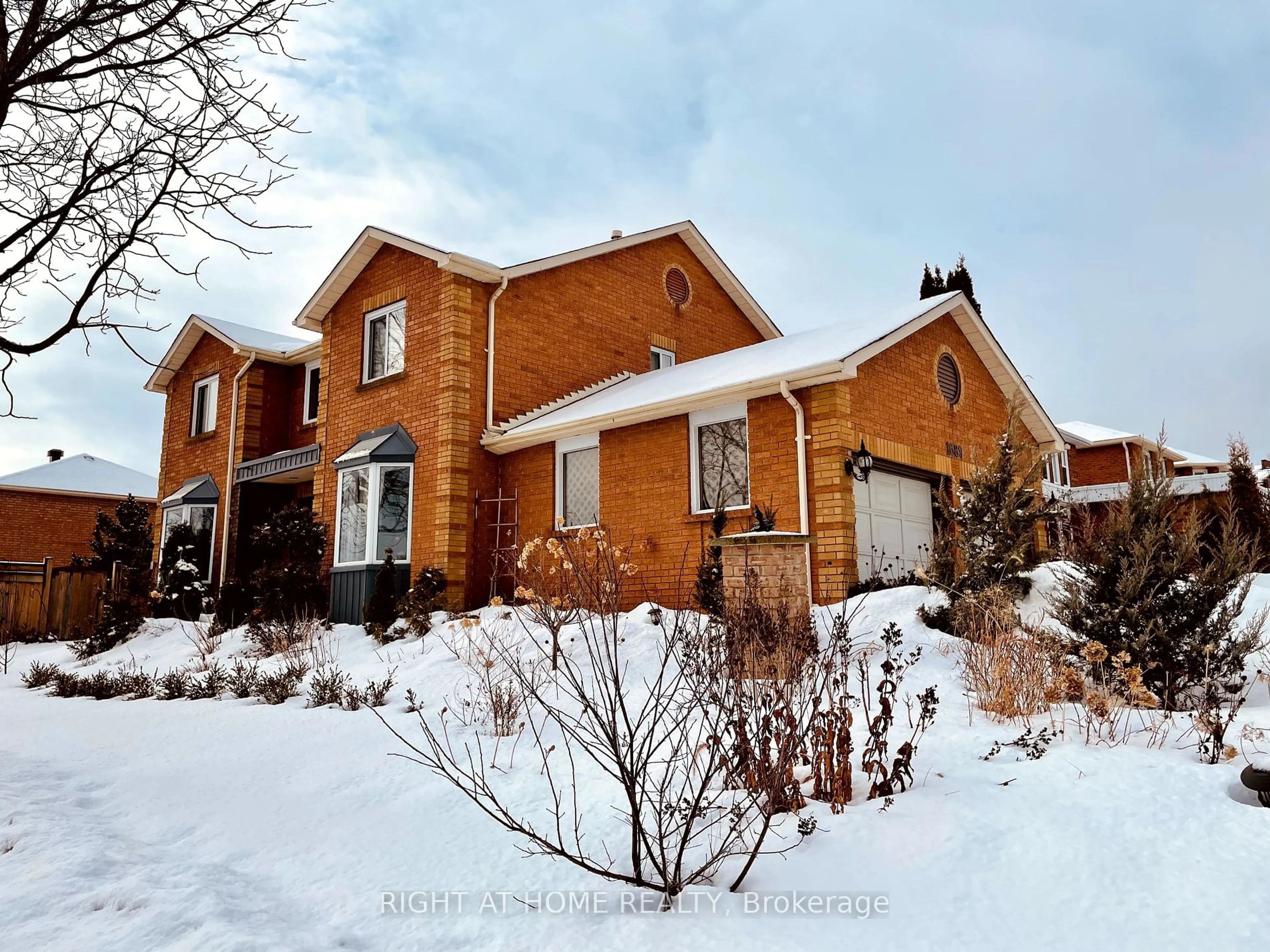 Home with brick exterior material, street for 1689 Major Oaks Rd, Pickering Ontario L1X 1X1