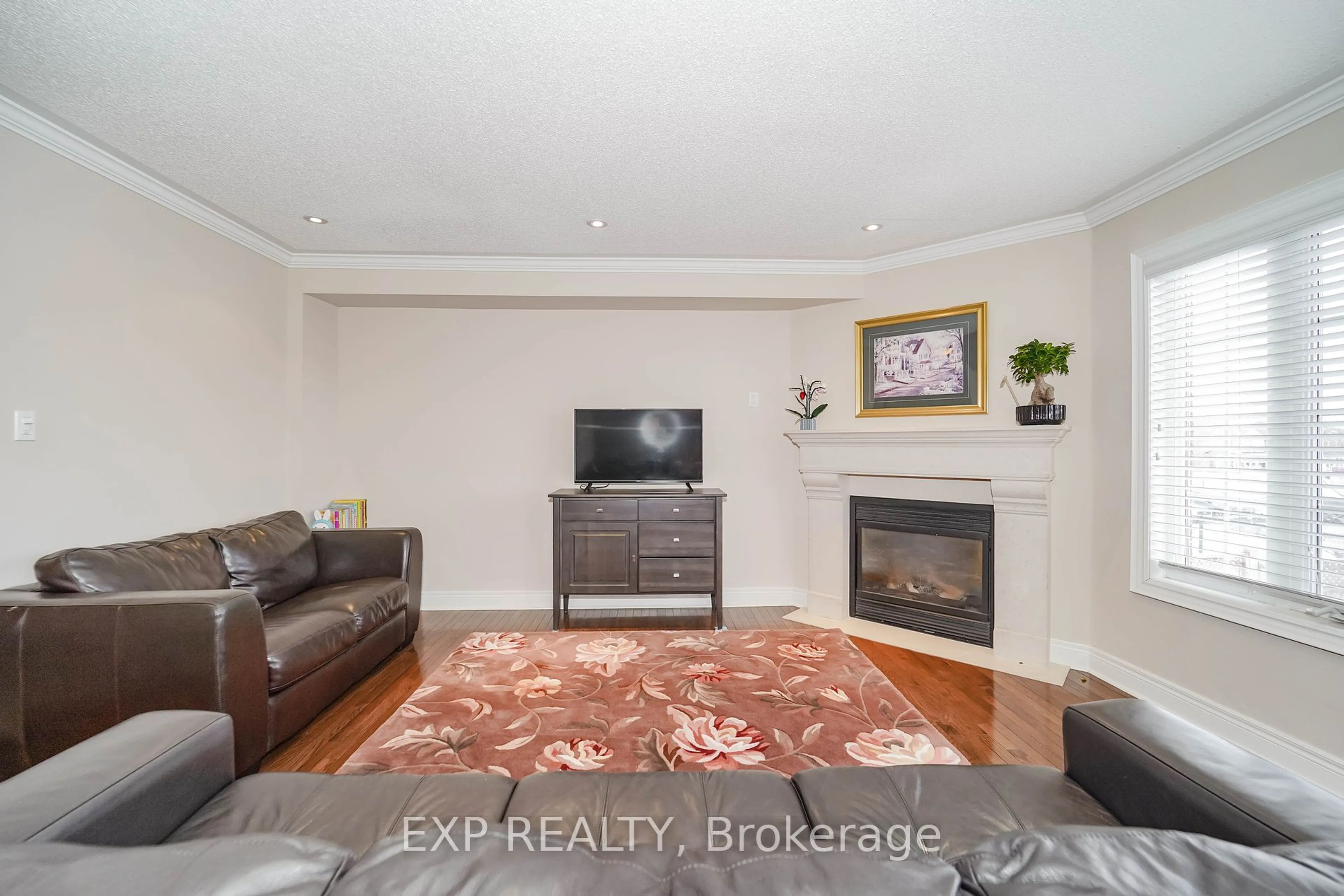 Living room with furniture, wood/laminate floor for 8 Bellinger Dr, Ajax Ontario L1T 4N3