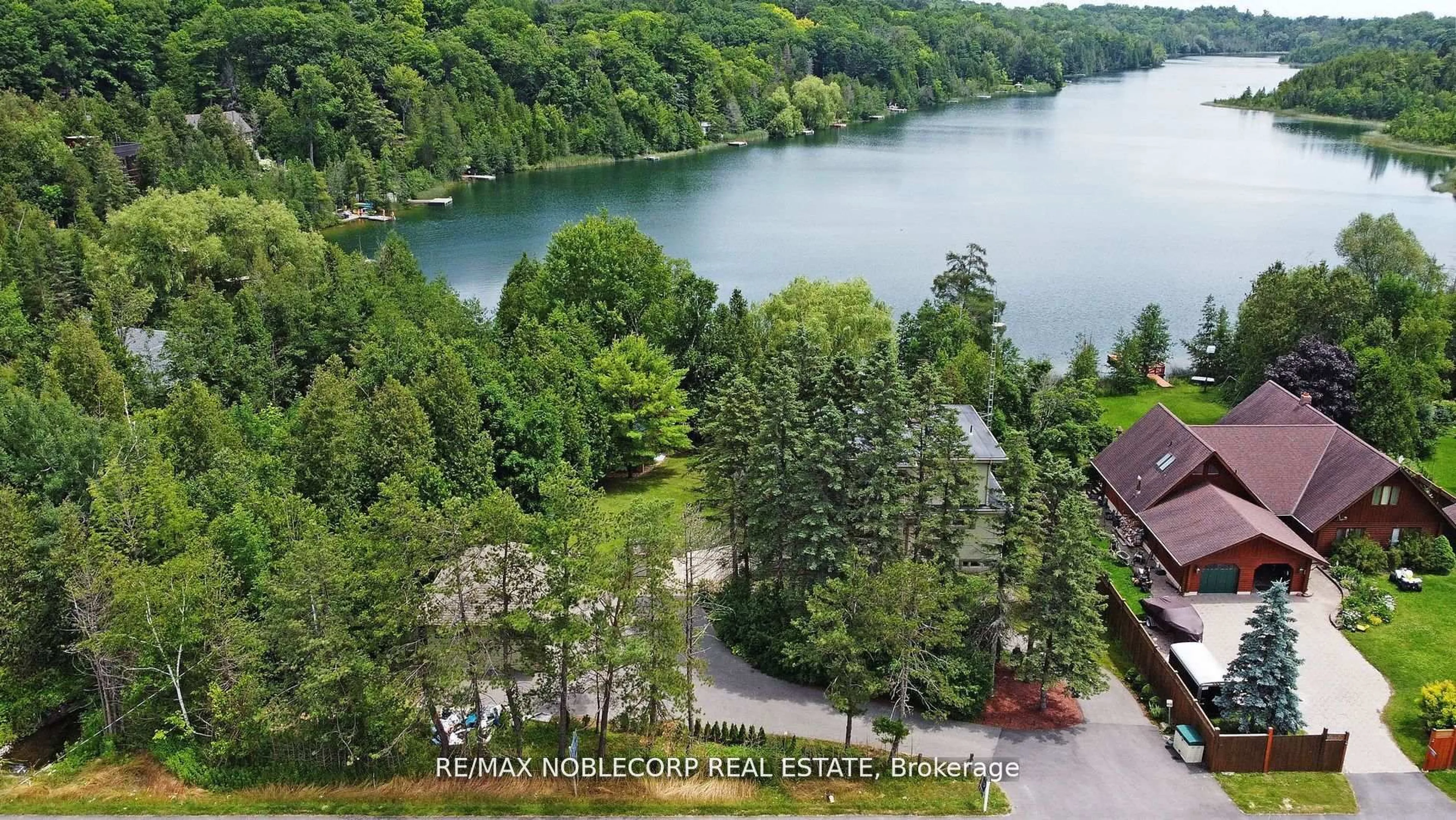 A pic from outside/outdoor area/front of a property/back of a property/a pic from drone, water/lake/river/ocean view for 11201 Lake Ridge Rd, Scugog Ontario L9L 1V7