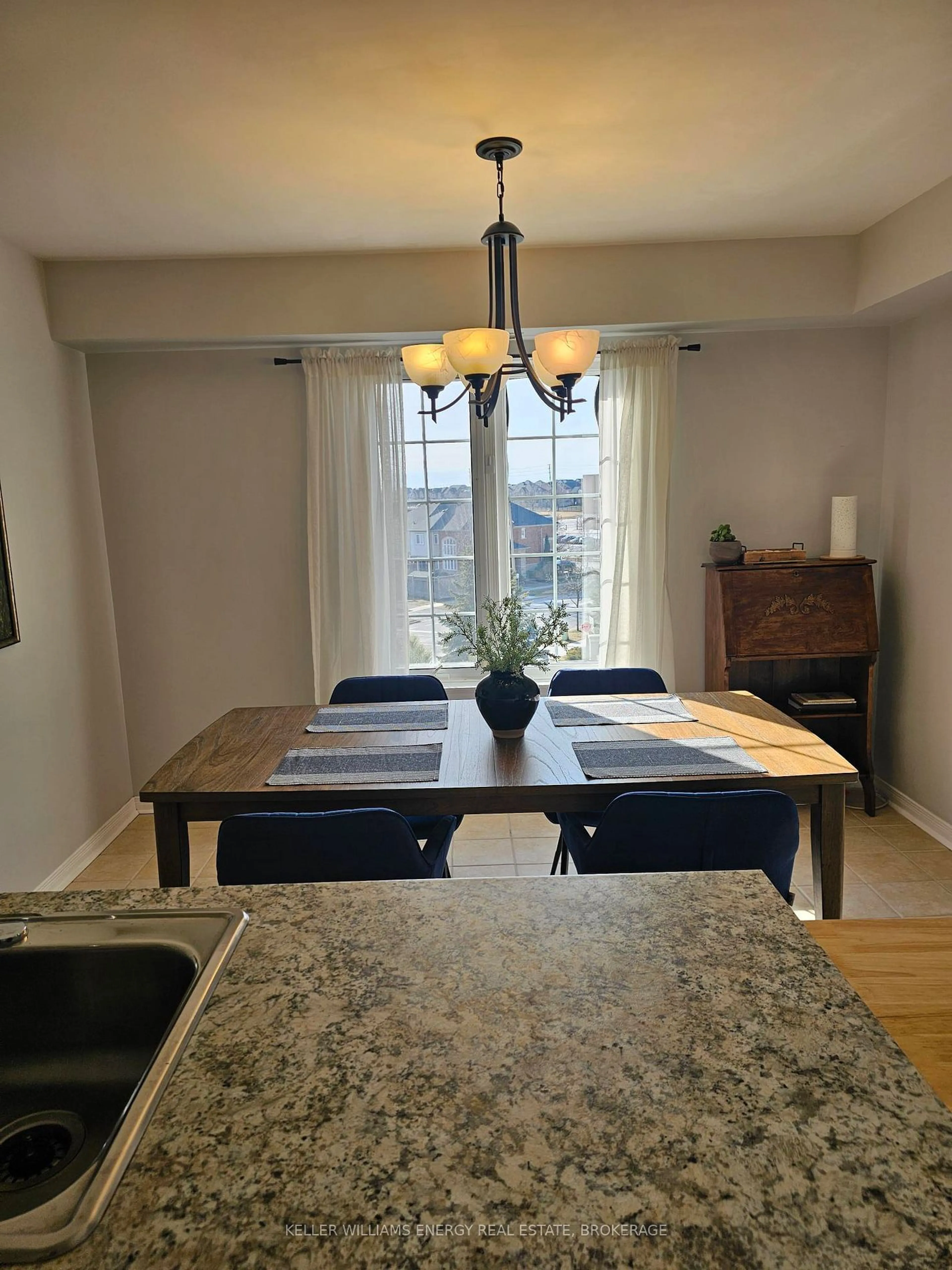 Dining room, wood/laminate floor for 106 Aspen Springs Dr #306, Clarington Ontario L1C 5N7