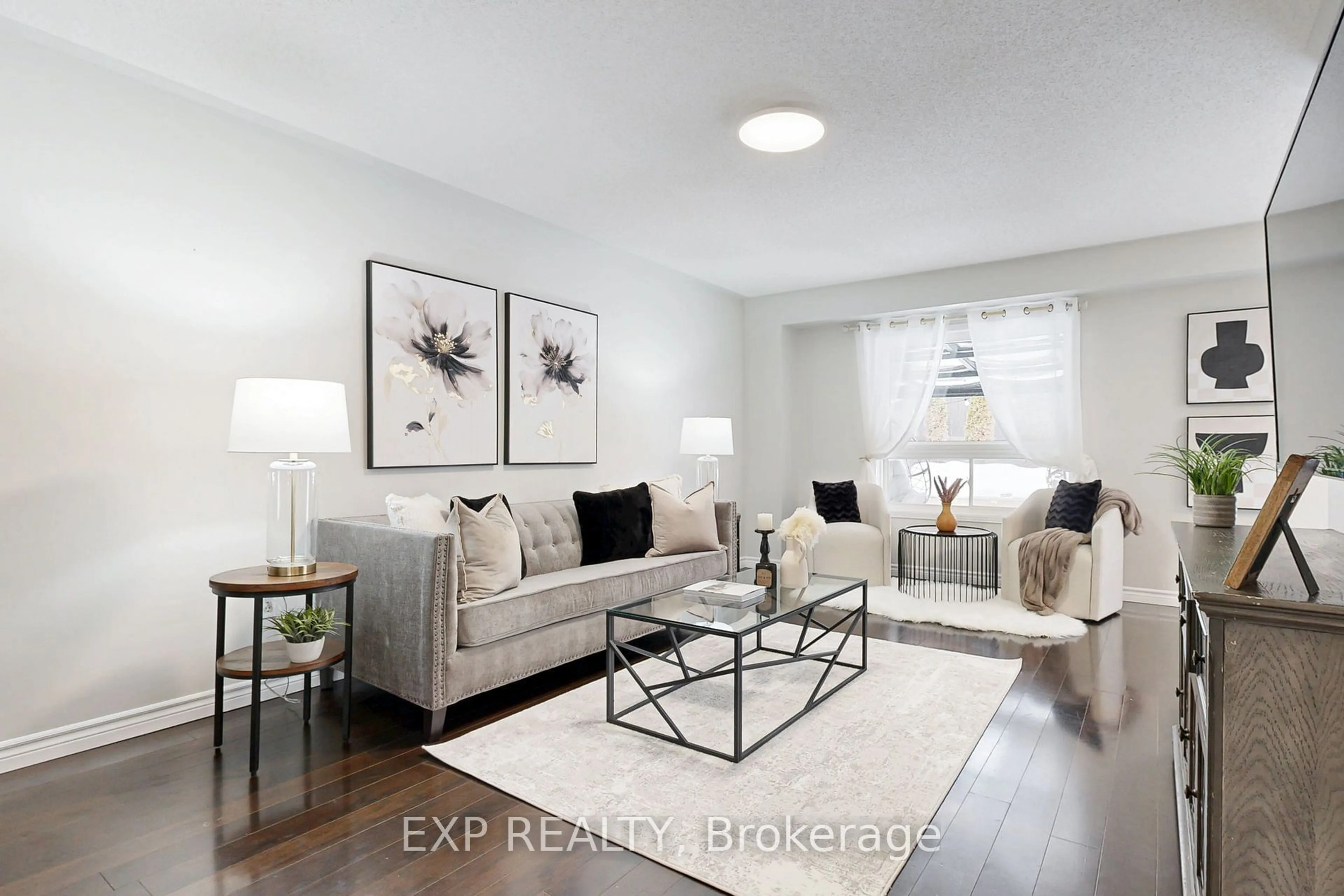 Living room with furniture, wood/laminate floor for 146 Bannister St, Clarington Ontario L1C 5L9