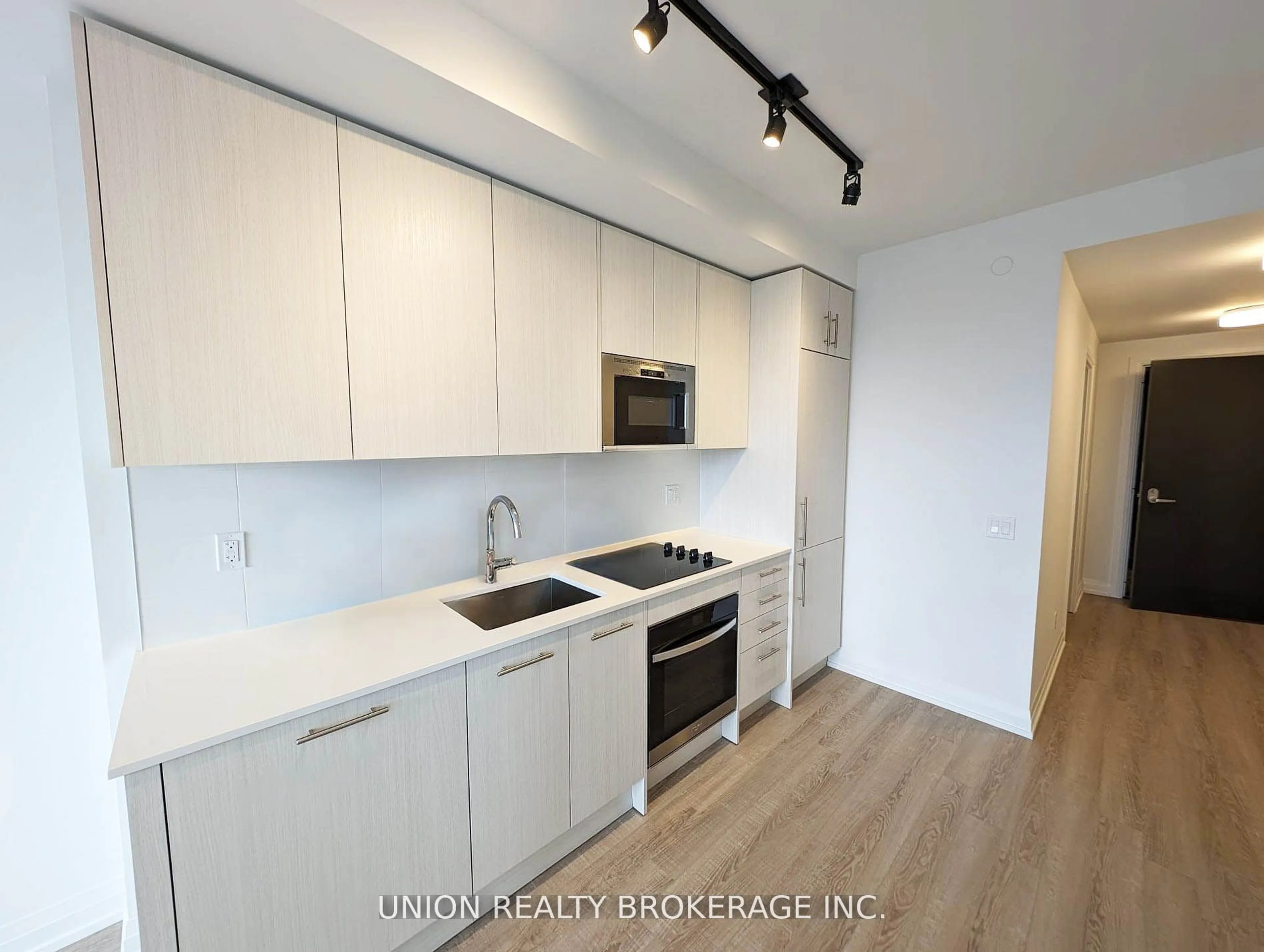 Standard kitchen, wood/laminate floor for 286 Main St #2609, Toronto Ontario M4C 0B3