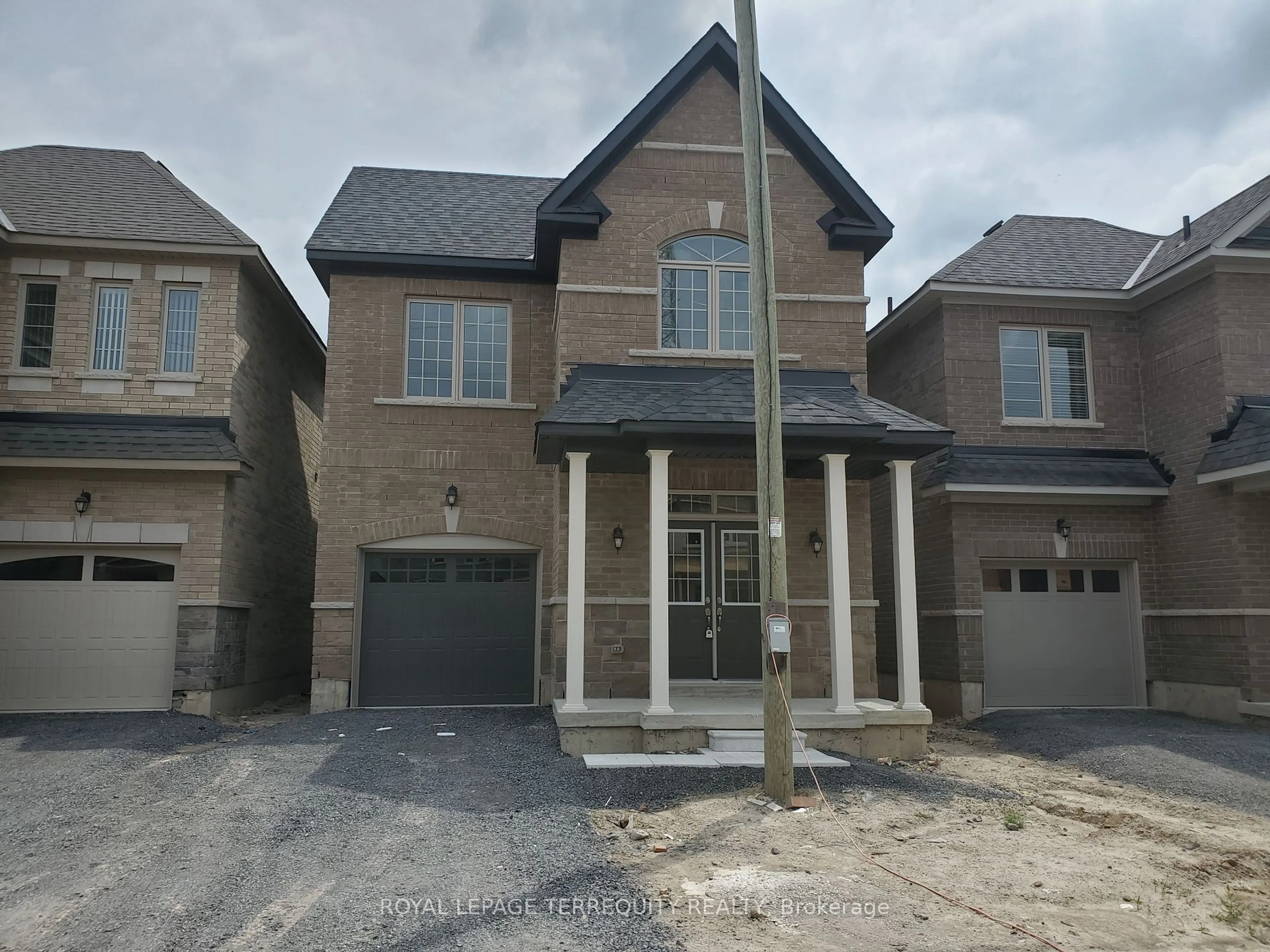 Home with brick exterior material, street for 1095 Skyridge Blvd, Pickering Ontario L1X 0M8