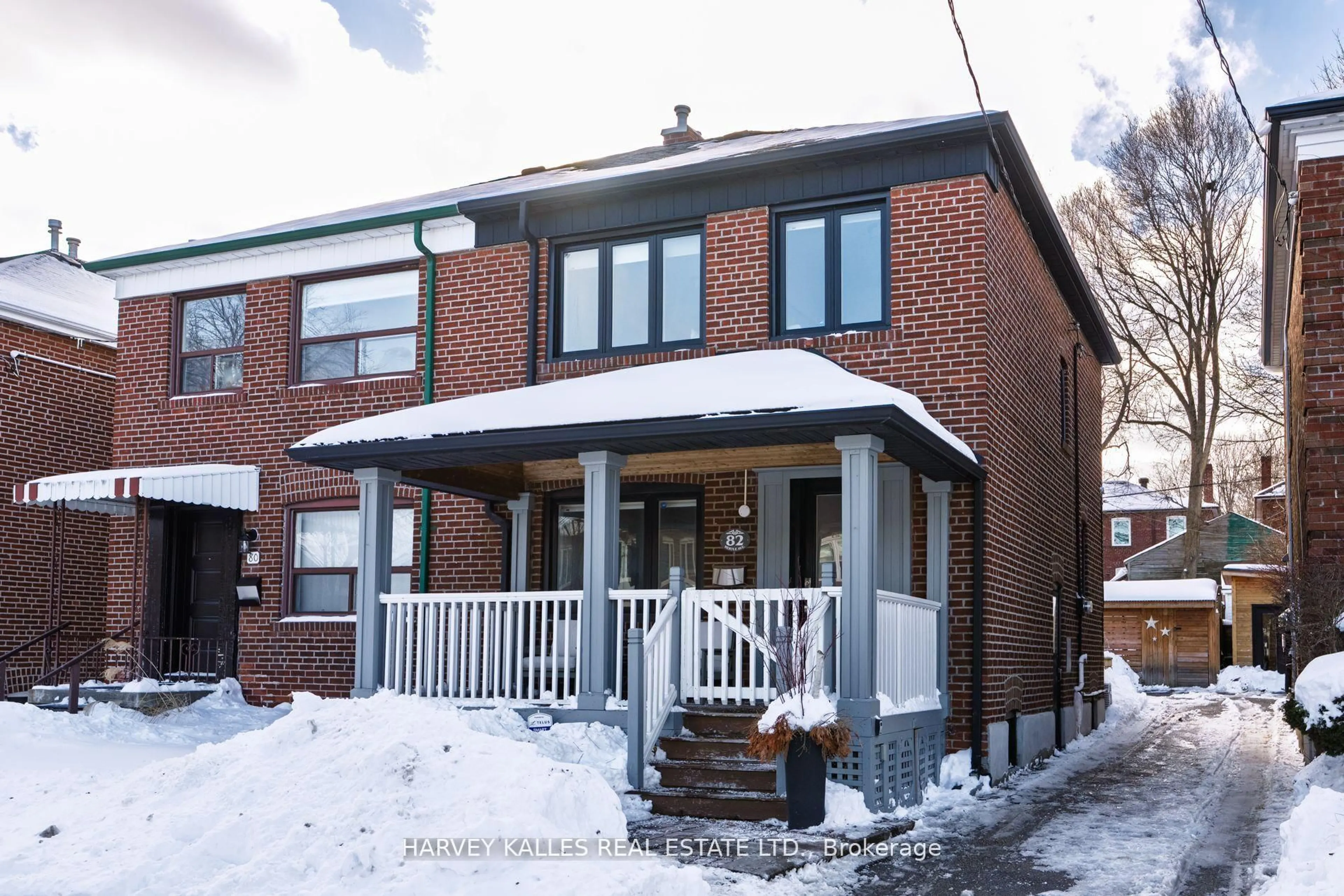 Home with brick exterior material, street for 82 Hertle Ave, Toronto Ontario M4L 2T4